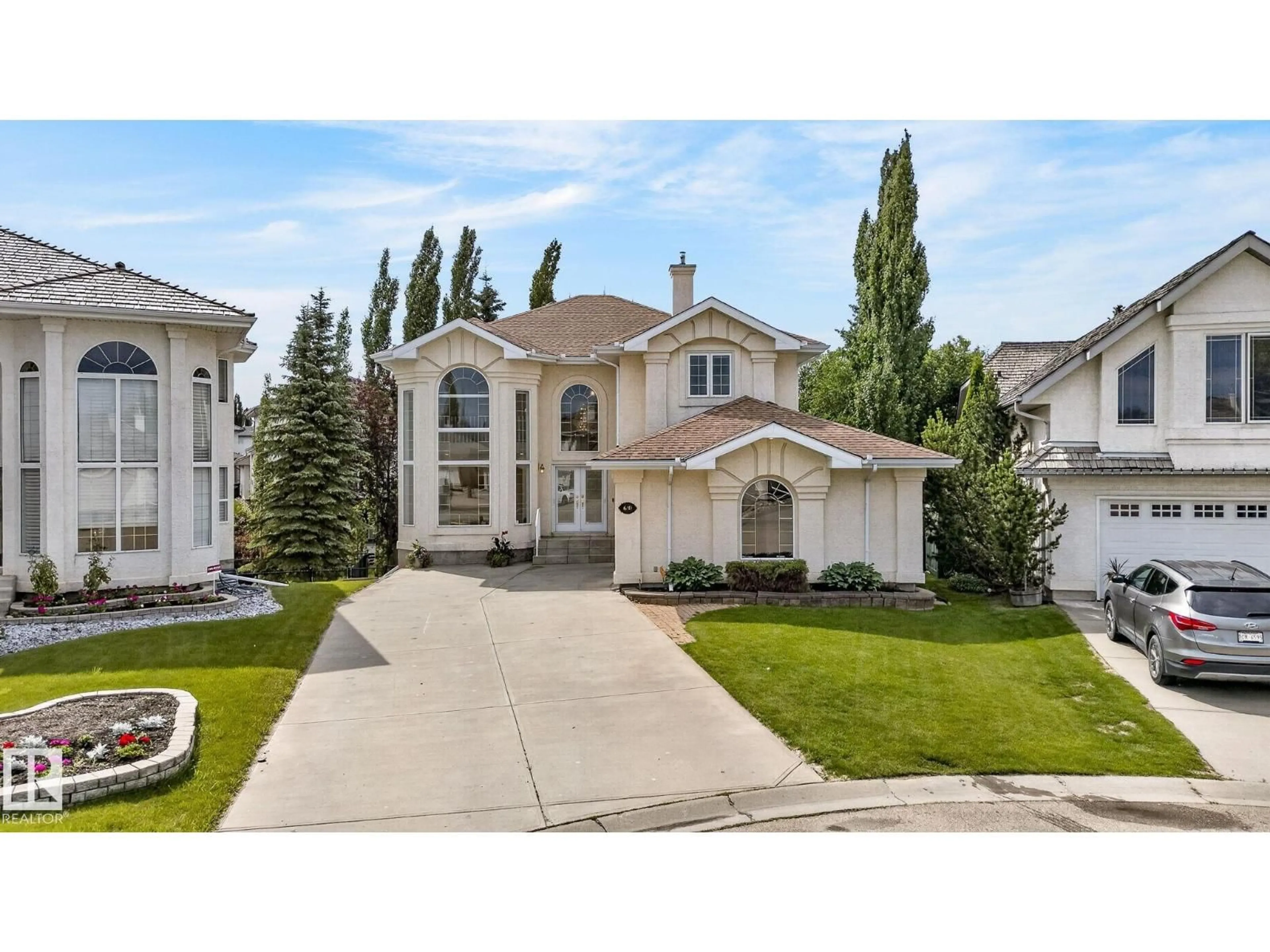 Home with vinyl exterior material, street for 610 HUNTERS CLOSE, Edmonton Alberta T6R2W2