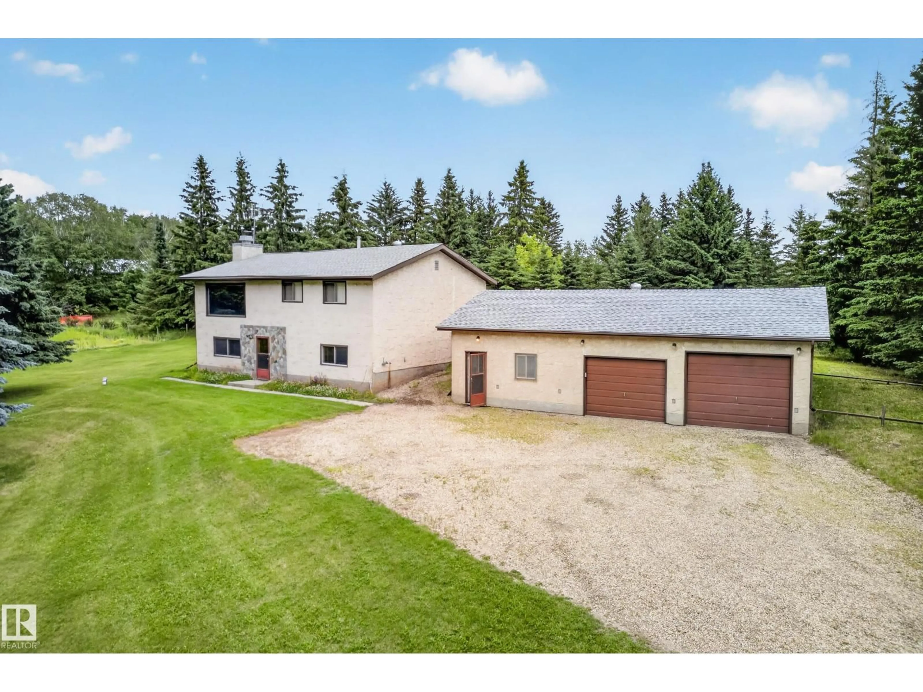 A pic from outside/outdoor area/front of a property/back of a property/a pic from drone, unknown for #6 - 52510 RGE ROAD 20, Rural Parkland County Alberta T7Y2G7