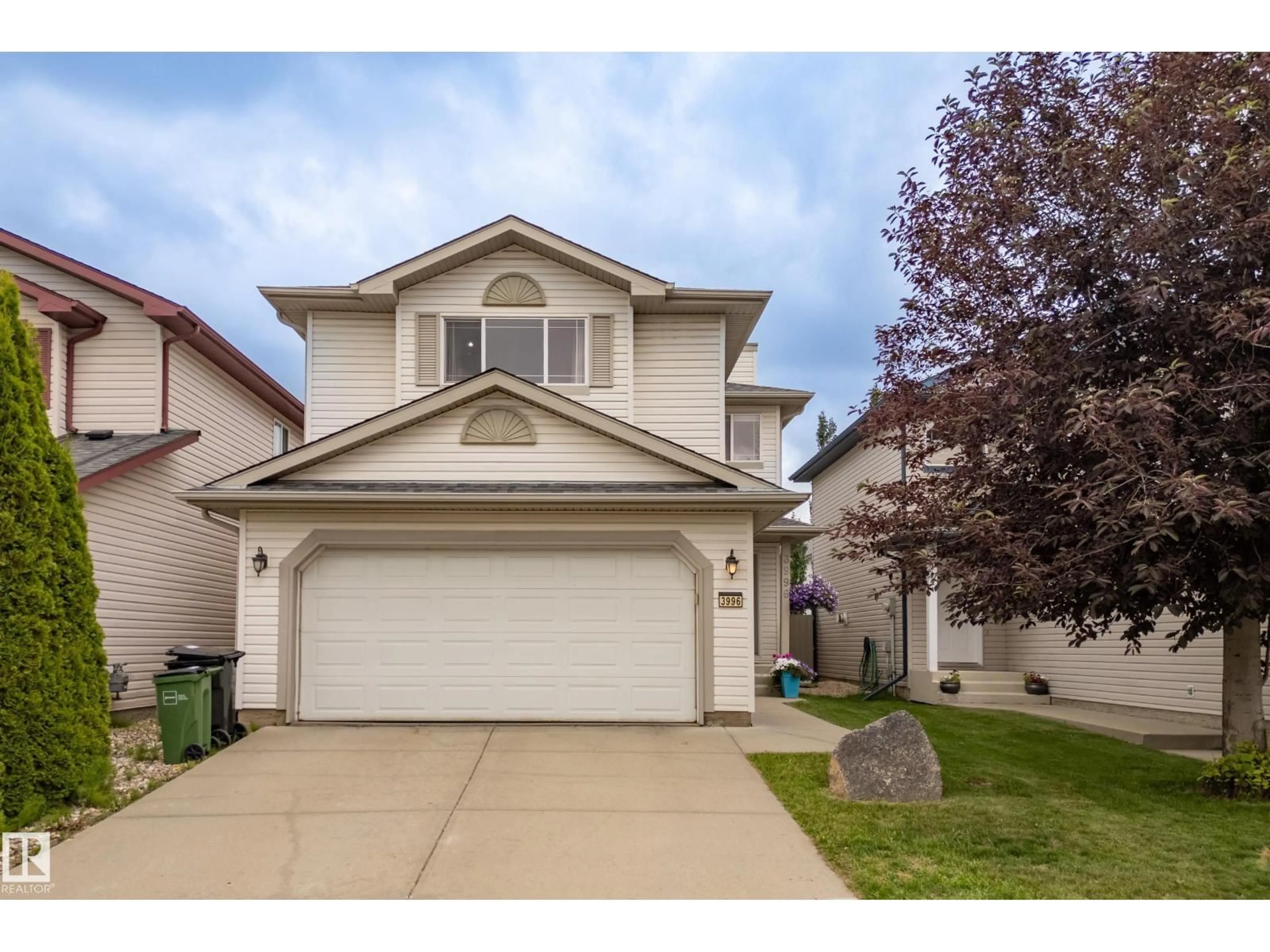 Home with vinyl exterior material, street for SW - 3996 MCMULLEN GR, Edmonton Alberta T6W1S8