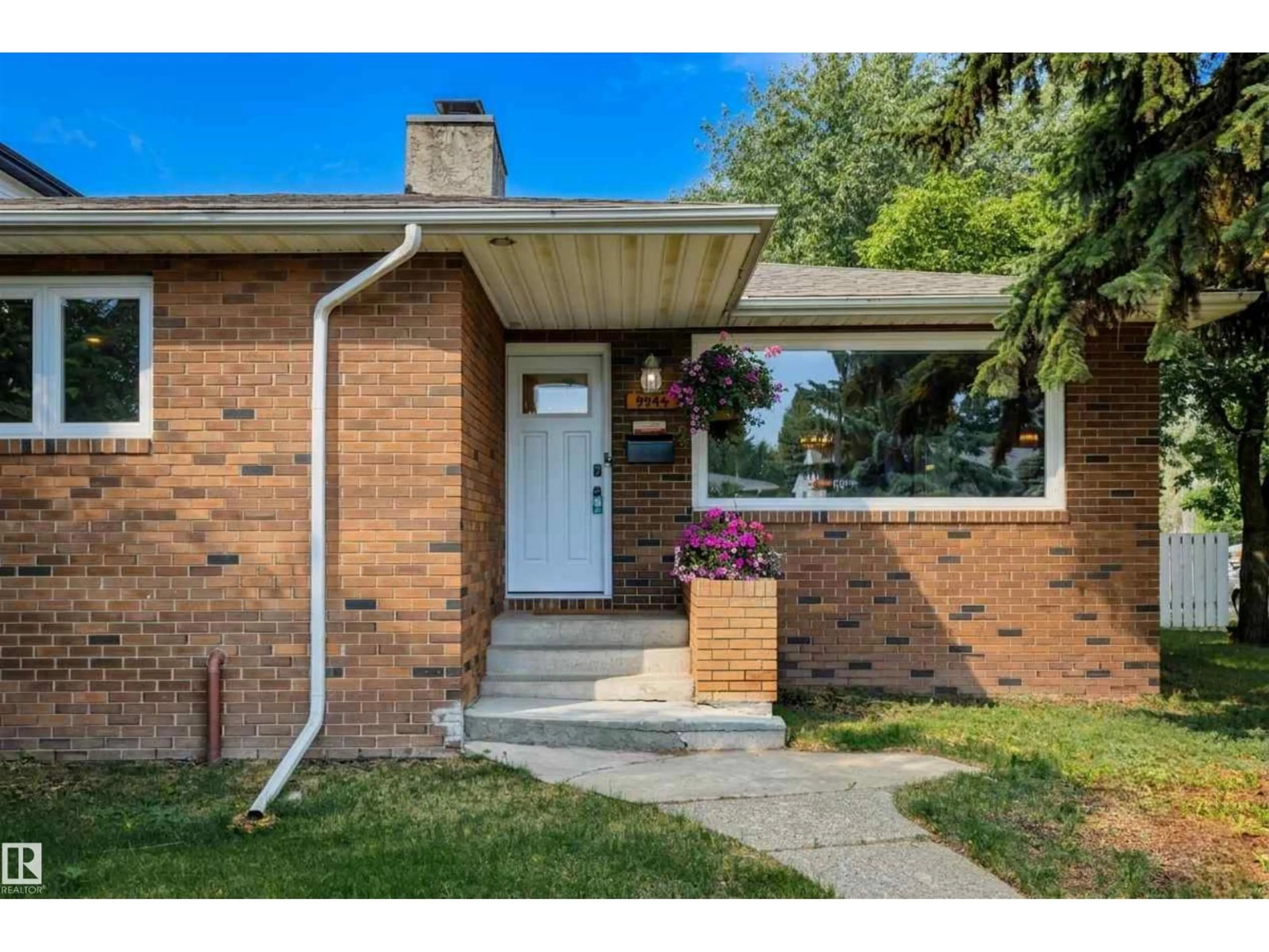 Home with brick exterior material, street for 9544 148 ST, Edmonton Alberta T5N3E4