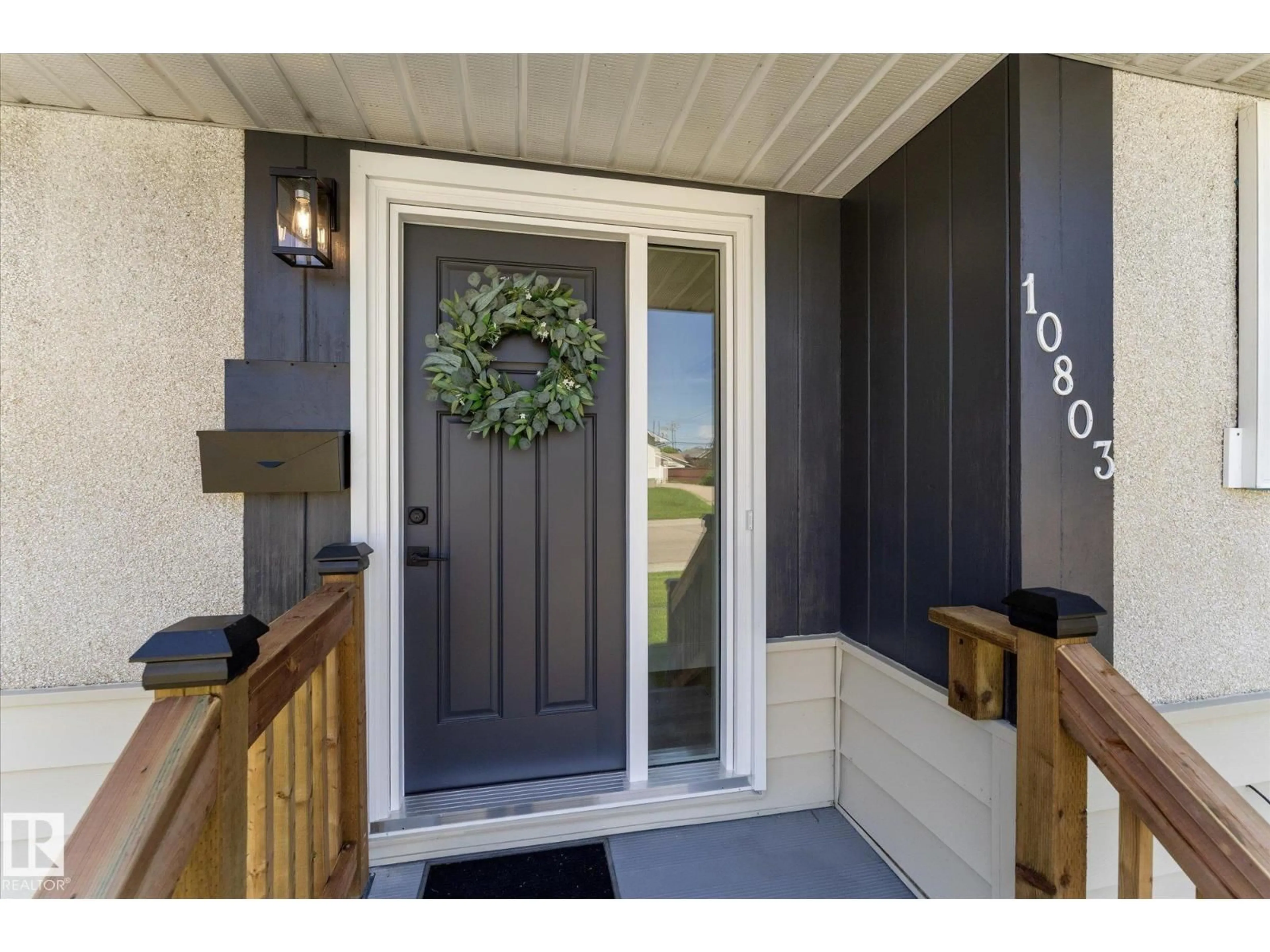 Indoor entryway for 10803 136 AV, Edmonton Alberta T5E1W6