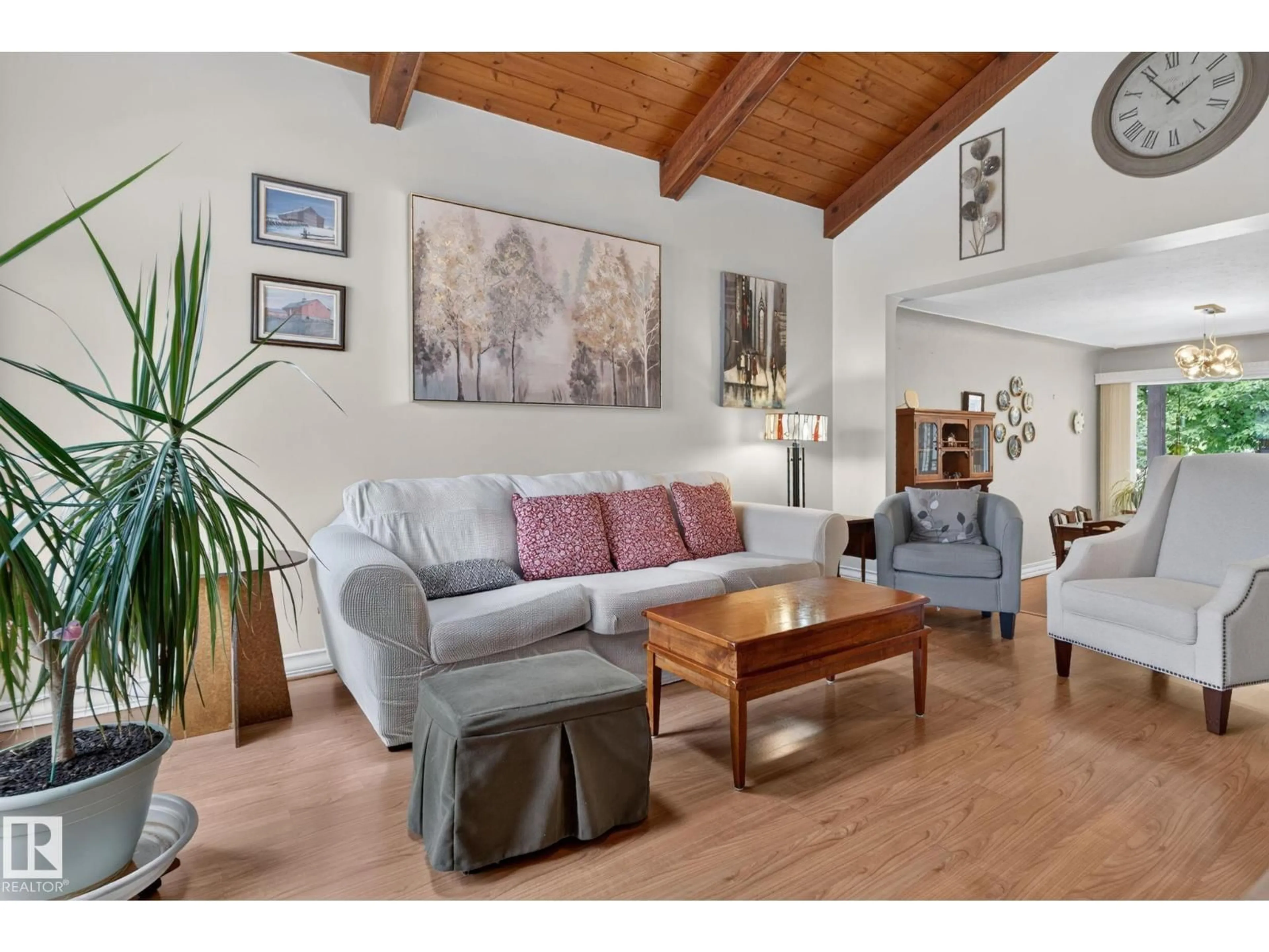 Living room with furniture, wood/laminate floor for NW - 12703 122 ST, Edmonton Alberta T5L0E3