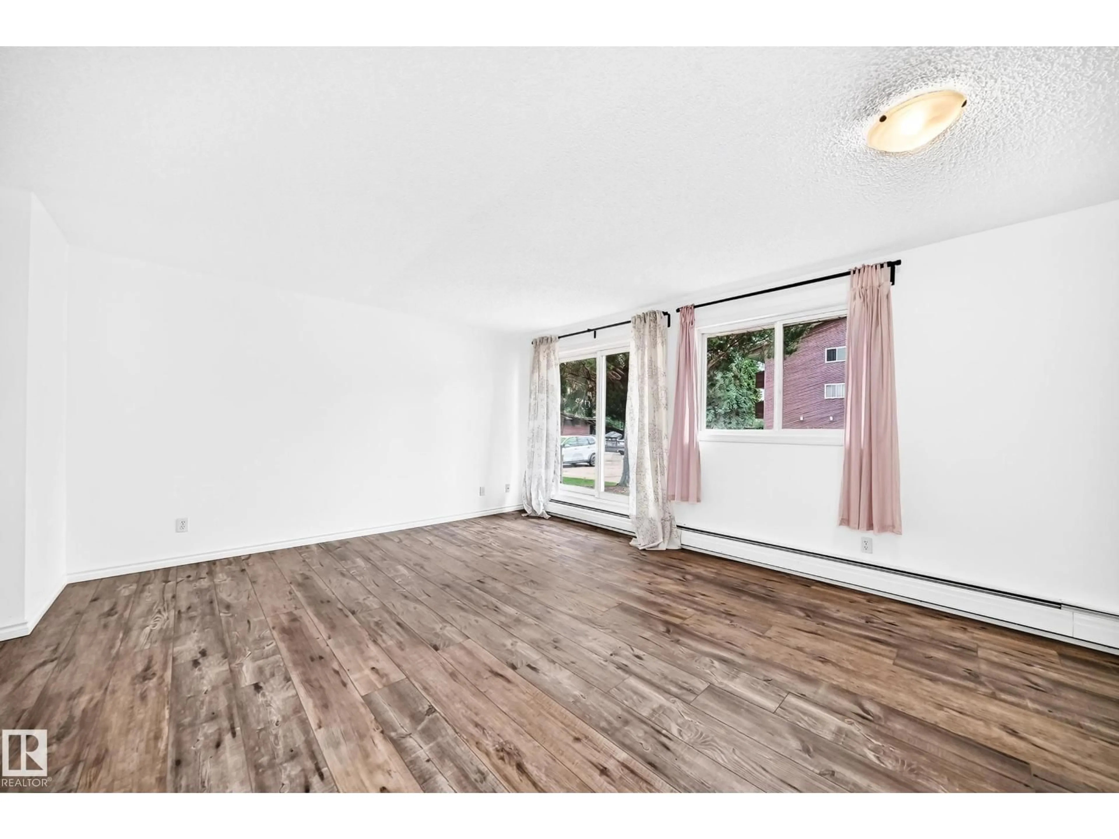 A pic of a room for #104 - 2303 119 ST, Edmonton Alberta T6J4E2