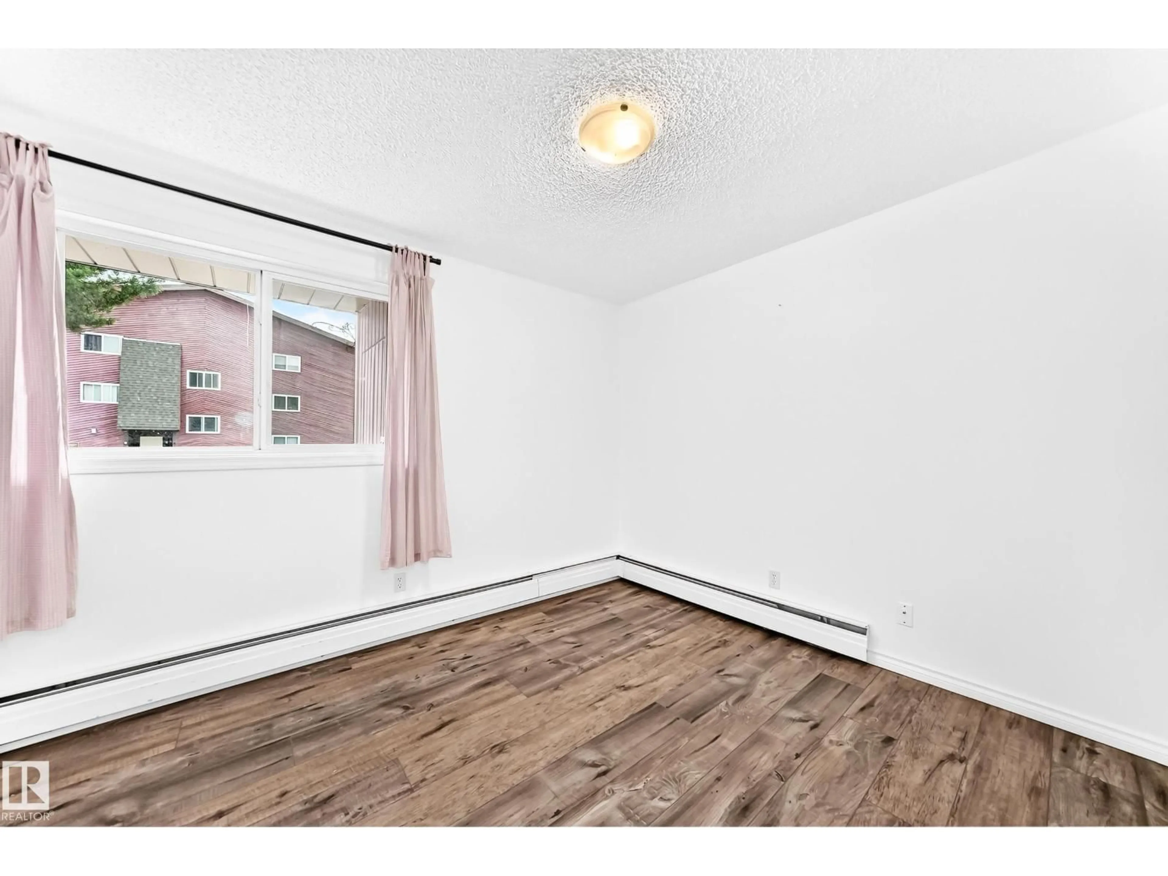 A pic of a room for #104 - 2303 119 ST, Edmonton Alberta T6J4E2