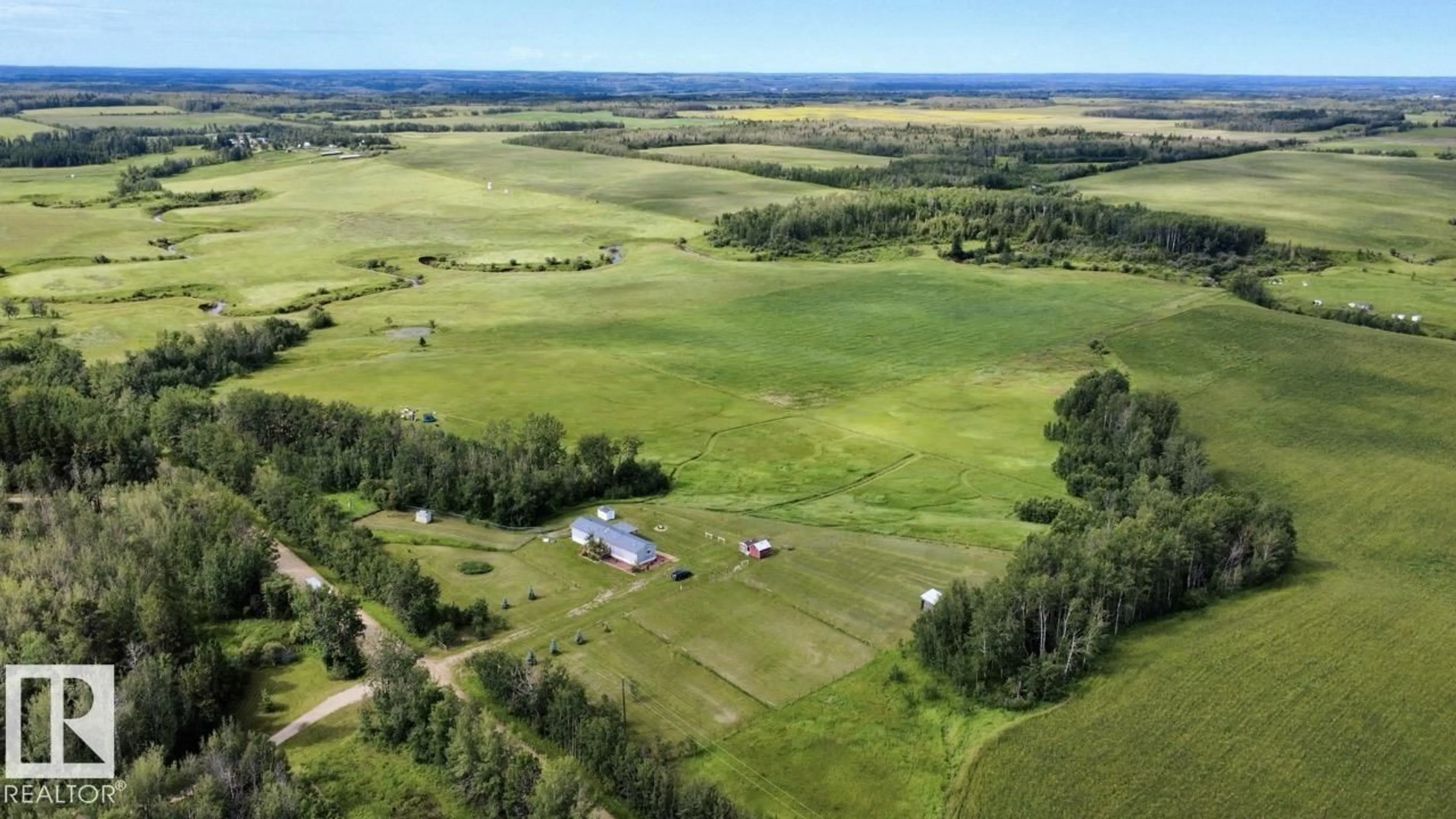 A pic from outside/outdoor area/front of a property/back of a property/a pic from drone, unknown for 50528 RR 53, Rural Parkland County Alberta T0E2H0