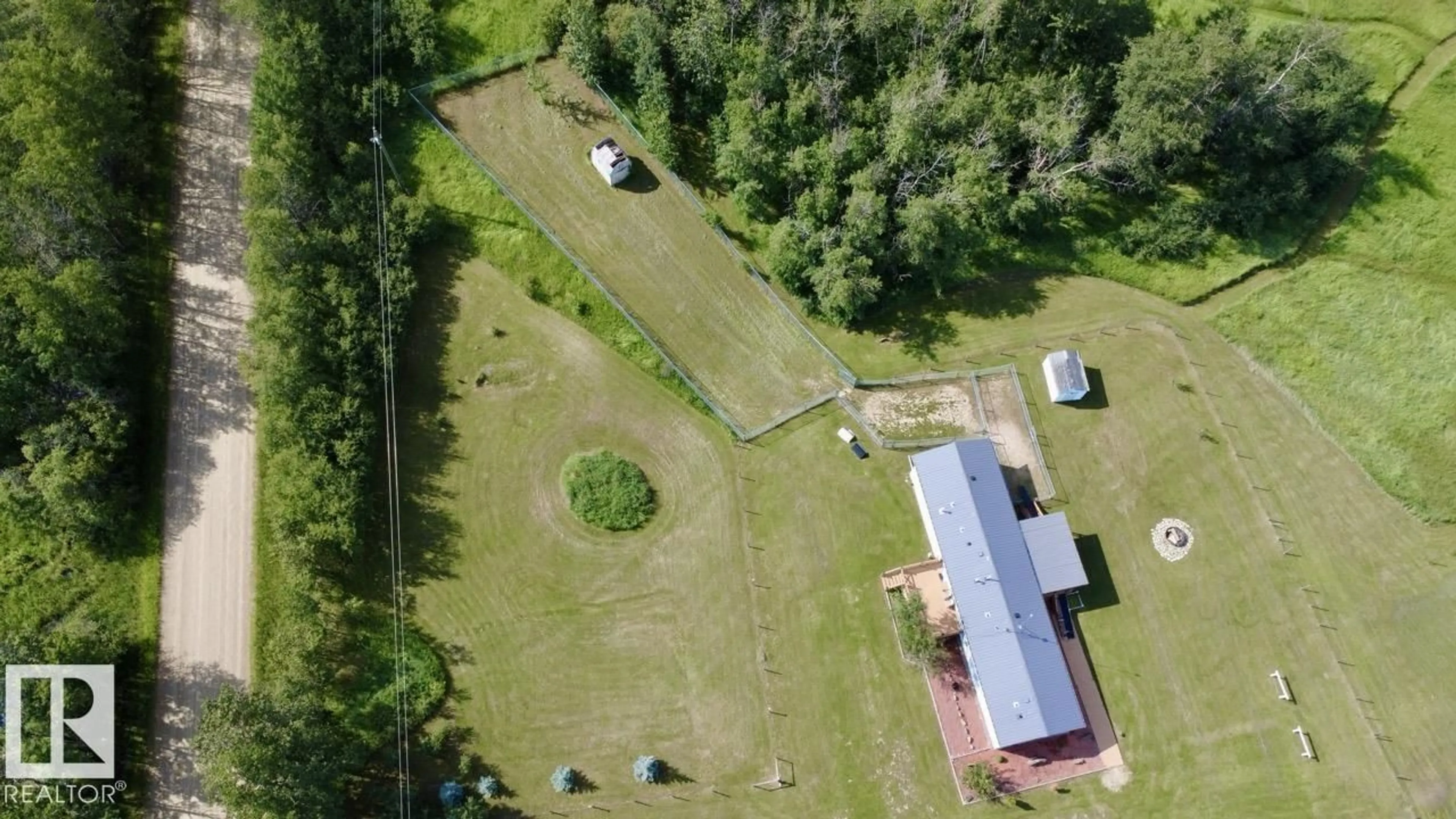 A pic from outside/outdoor area/front of a property/back of a property/a pic from drone, building for 50528 RR 53, Rural Parkland County Alberta T0E2H0