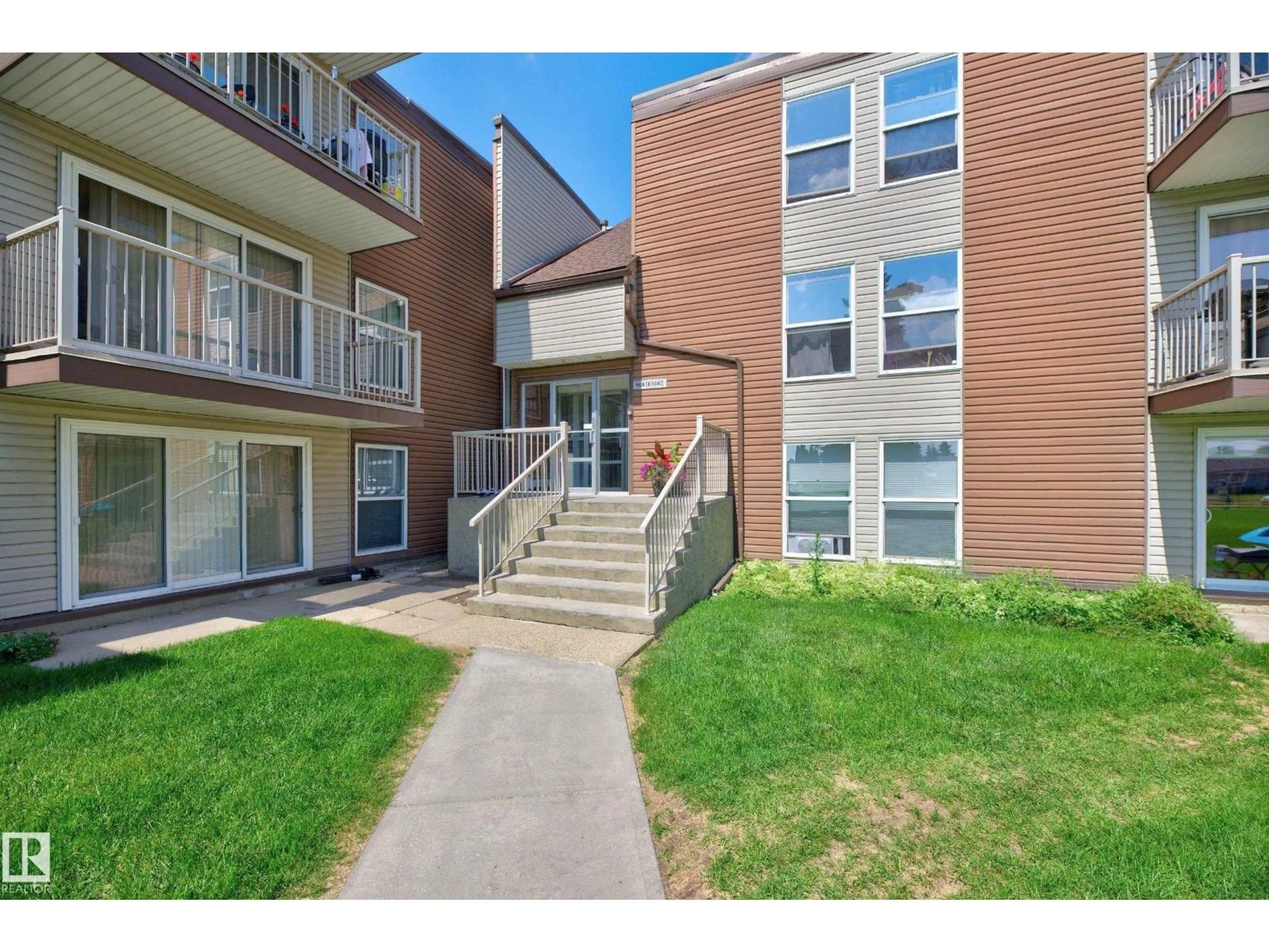 Patio, street for 209 - 7220 144 AV, Edmonton Alberta T4C3E4