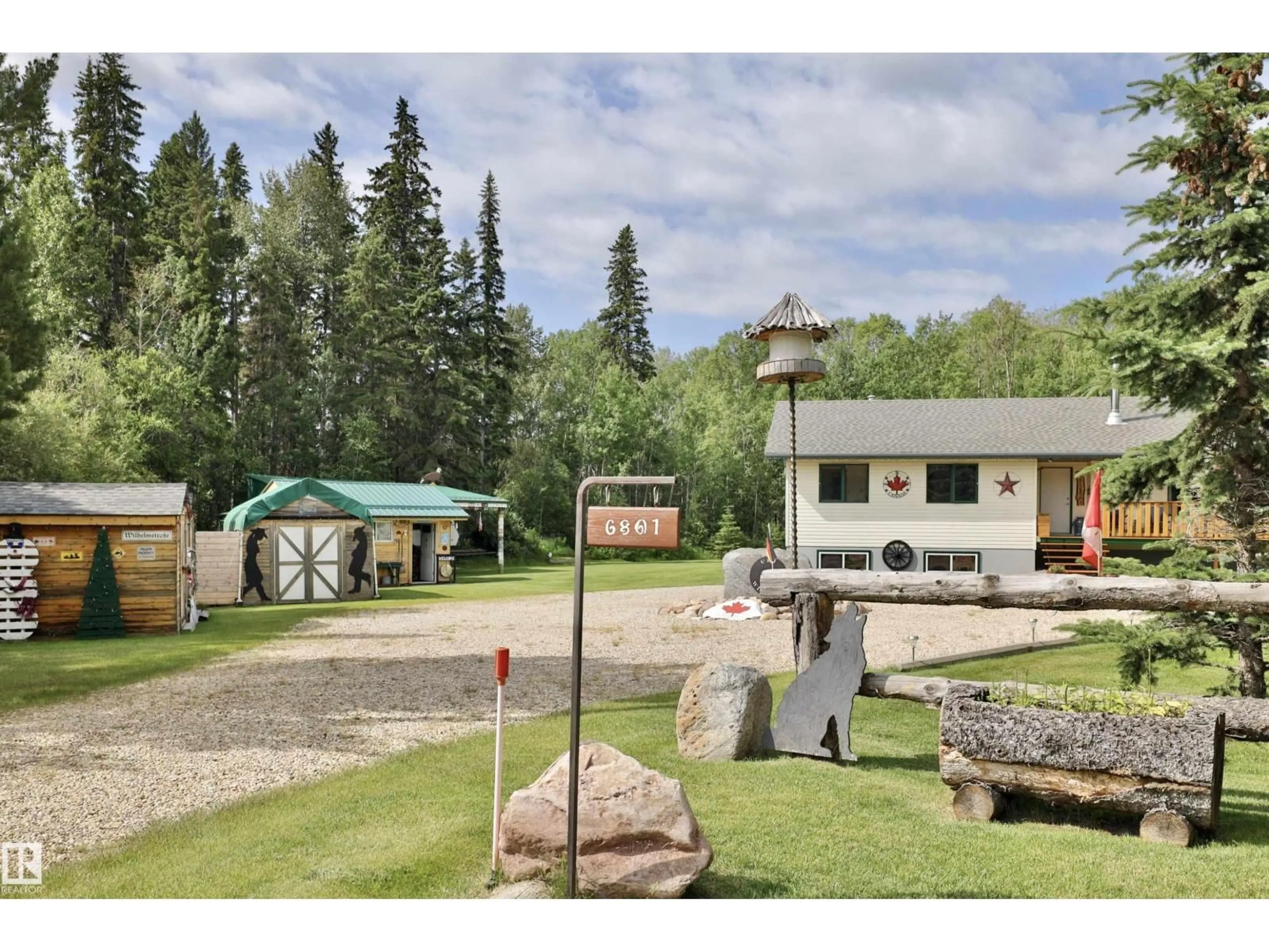 A pic from outside/outdoor area/front of a property/back of a property/a pic from drone, mountain view for 6801 51 ST, Rural Wetaskiwin County Alberta T0C2C0