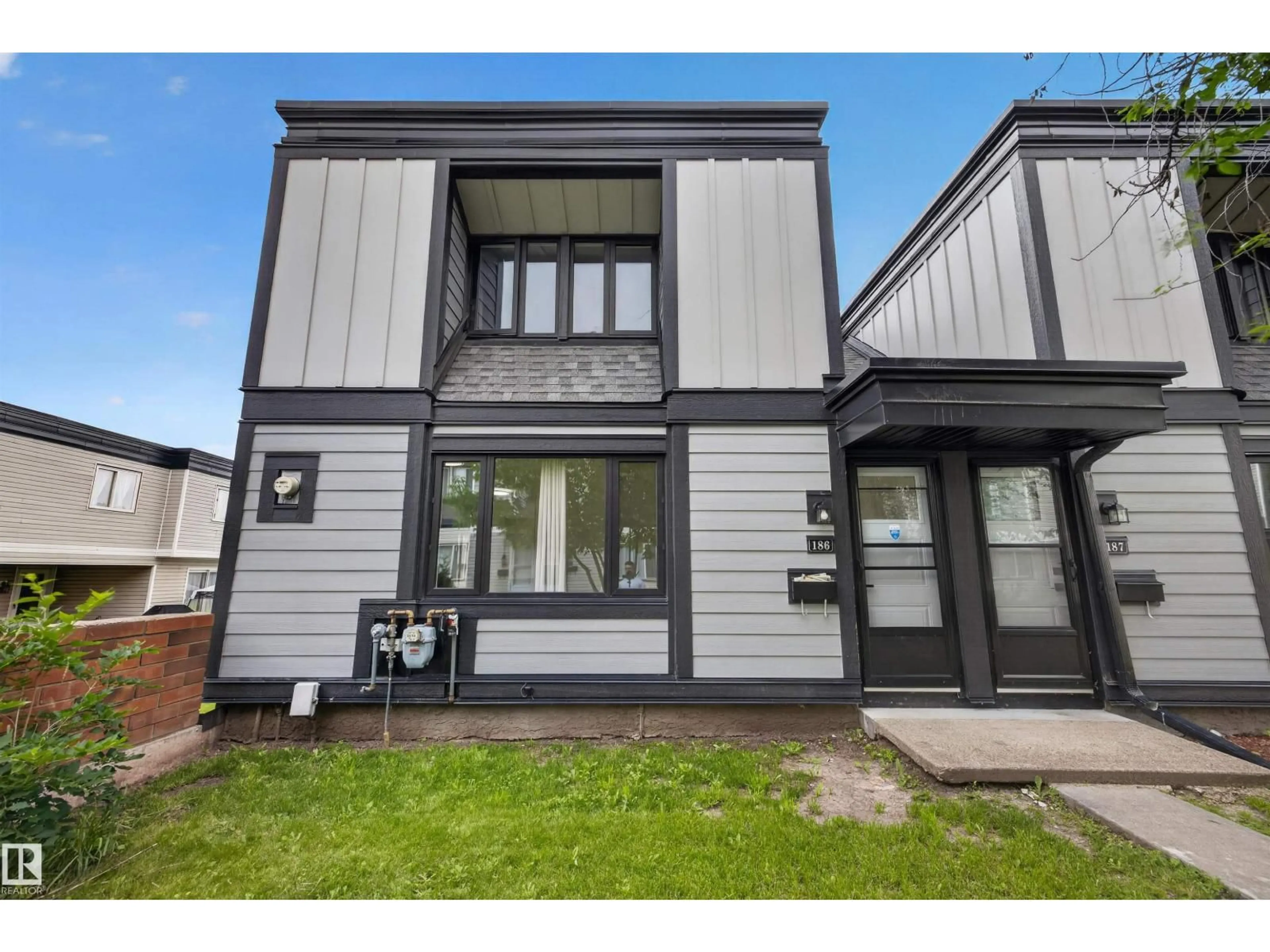 Home with vinyl exterior material, street for 186 11421 34 ST NW, Edmonton Alberta T5W5J7
