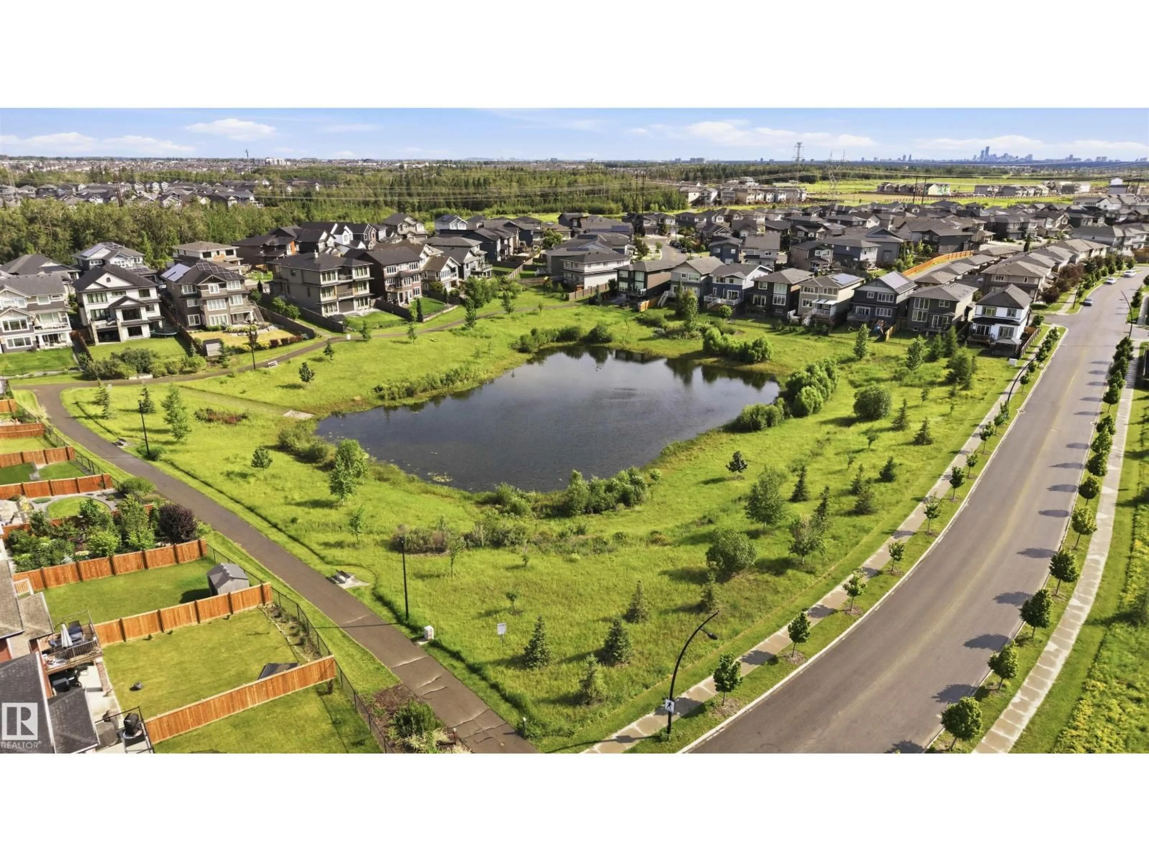 A pic from outside/outdoor area/front of a property/back of a property/a pic from drone, water/lake/river/ocean view for NW - 2604 202 ST, Edmonton Alberta T6M1K5
