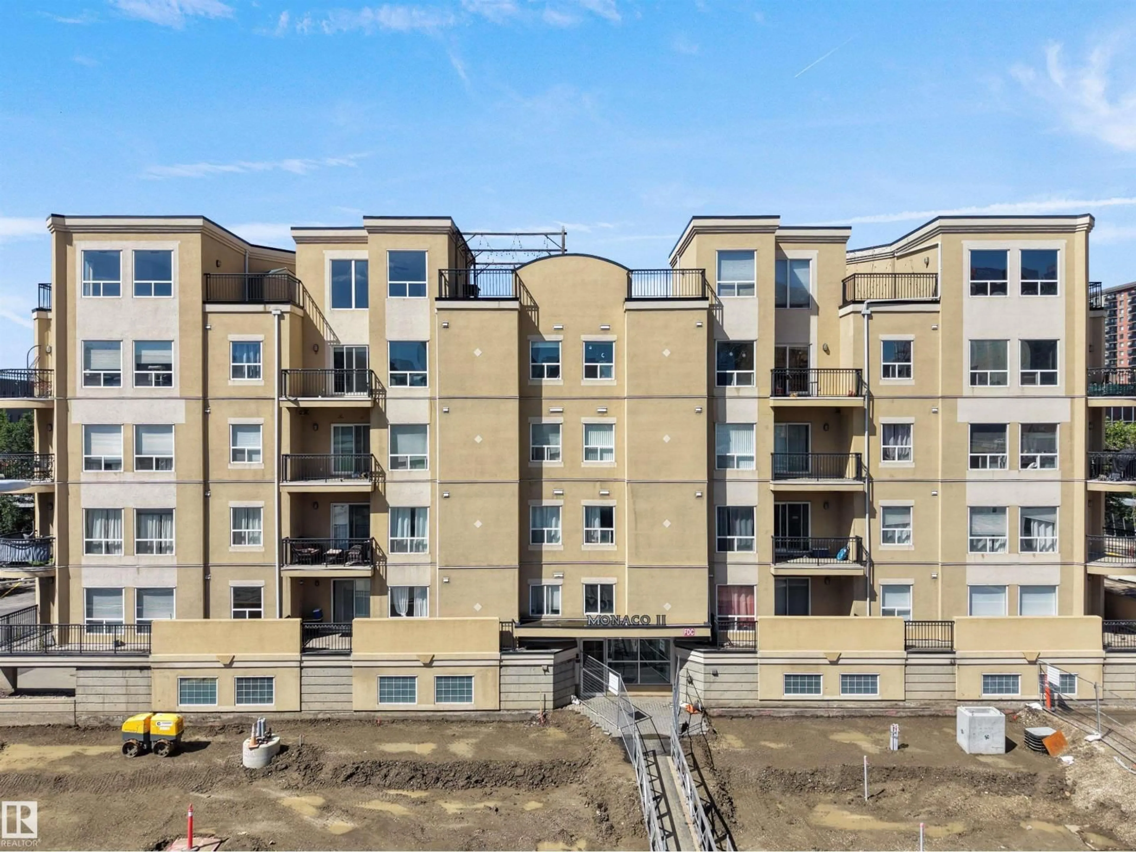 A pic from outside/outdoor area/front of a property/back of a property/a pic from drone, building for 207 - 10606 102 AV NW, Edmonton Alberta T5J5E9
