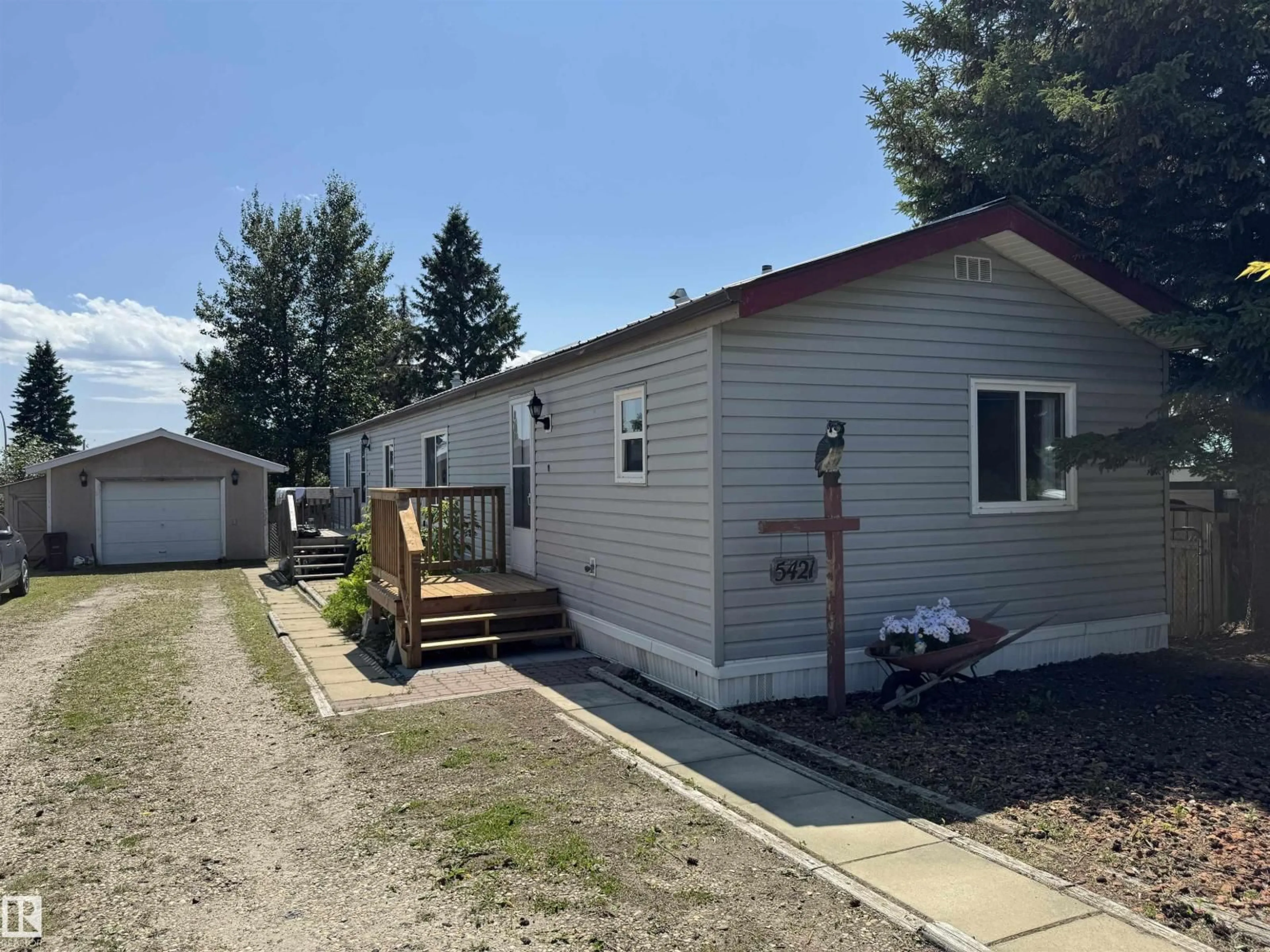 Home with vinyl exterior material, street for 5421 48A AVE, Drayton Valley Alberta T7A1J8