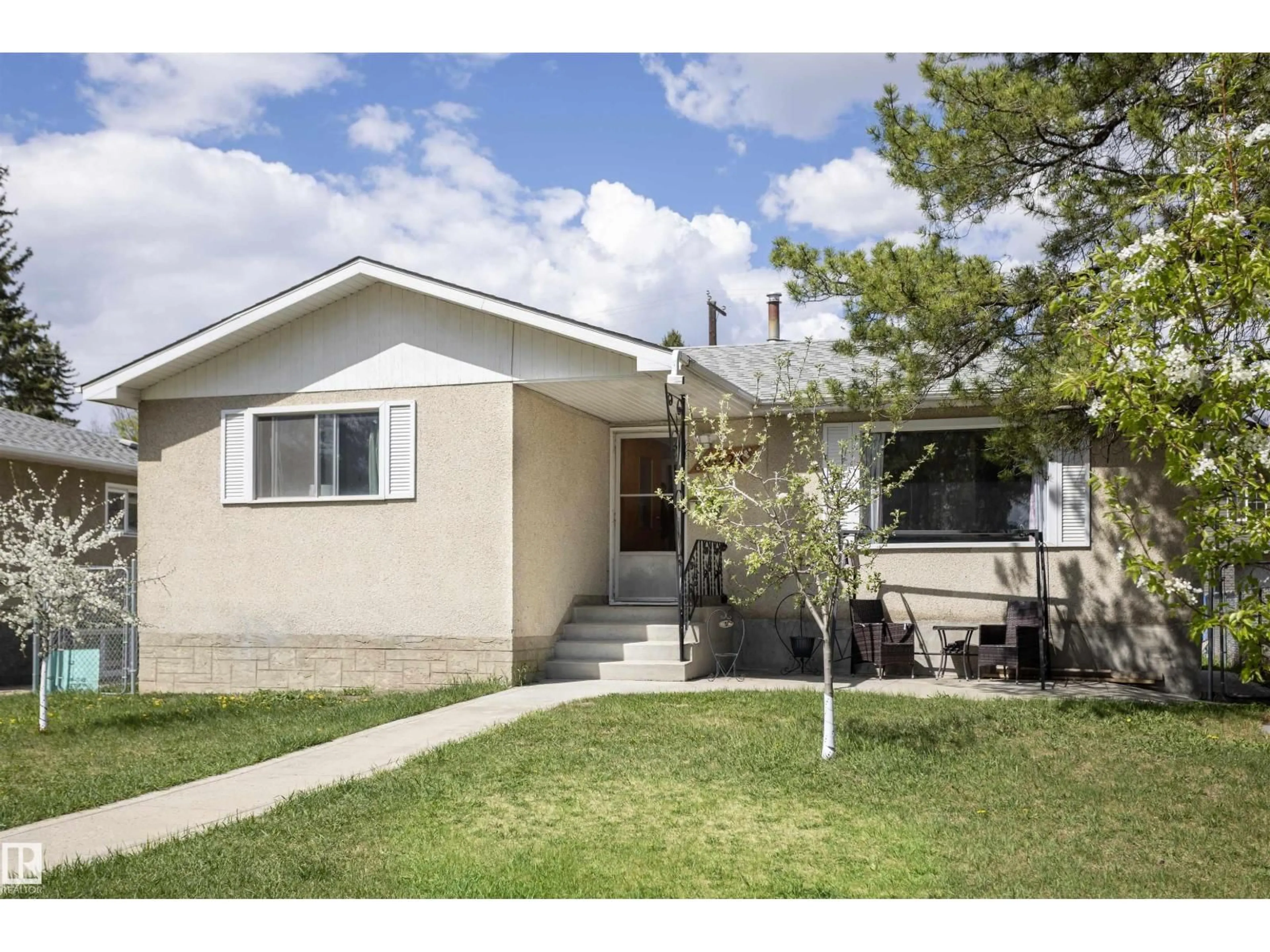 Home with vinyl exterior material, street for NW - 10428 68 AV, Edmonton Alberta T6H2A9
