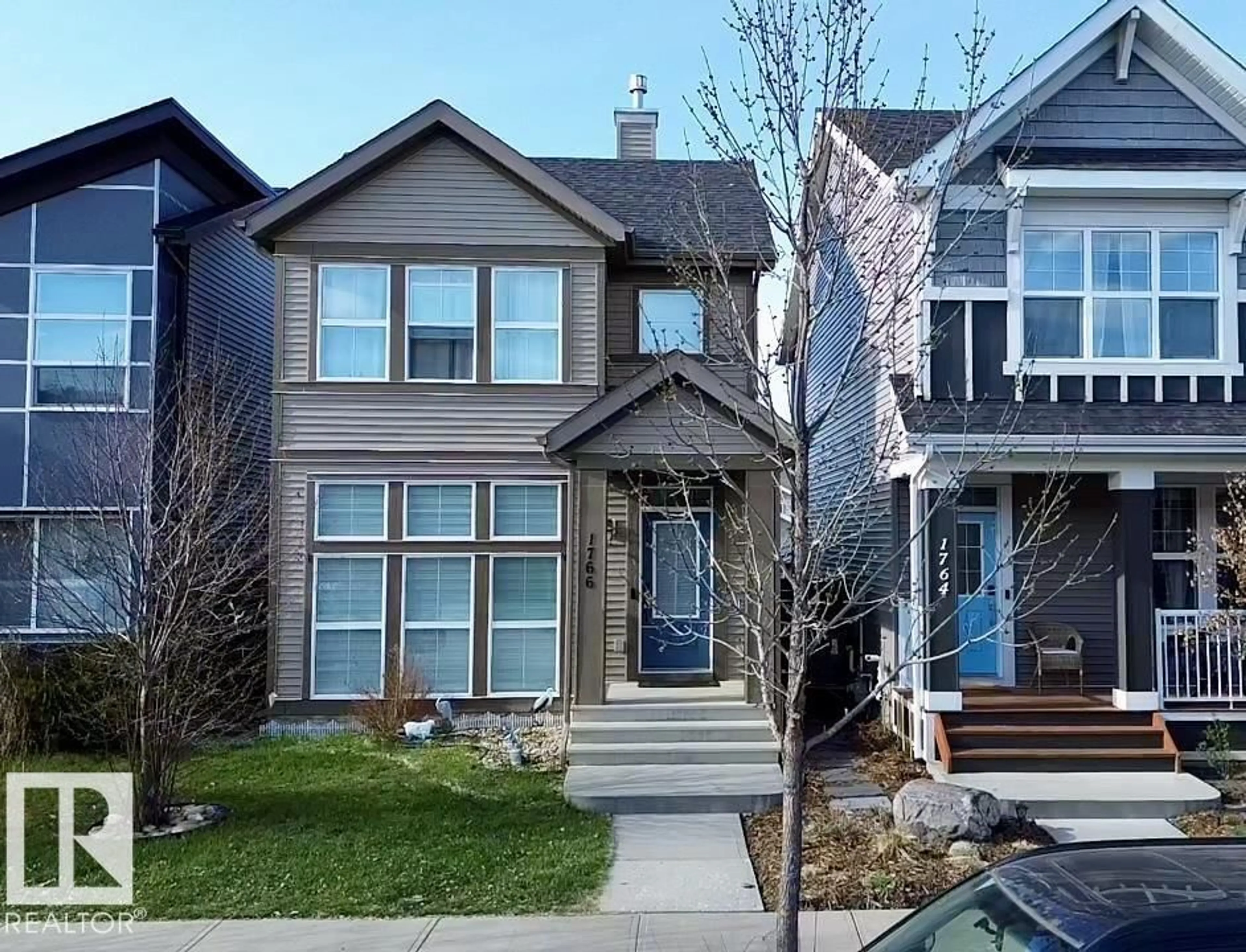Home with vinyl exterior material, street for SW SW - 1766 DUMONT CR, Edmonton Alberta T6W3V8