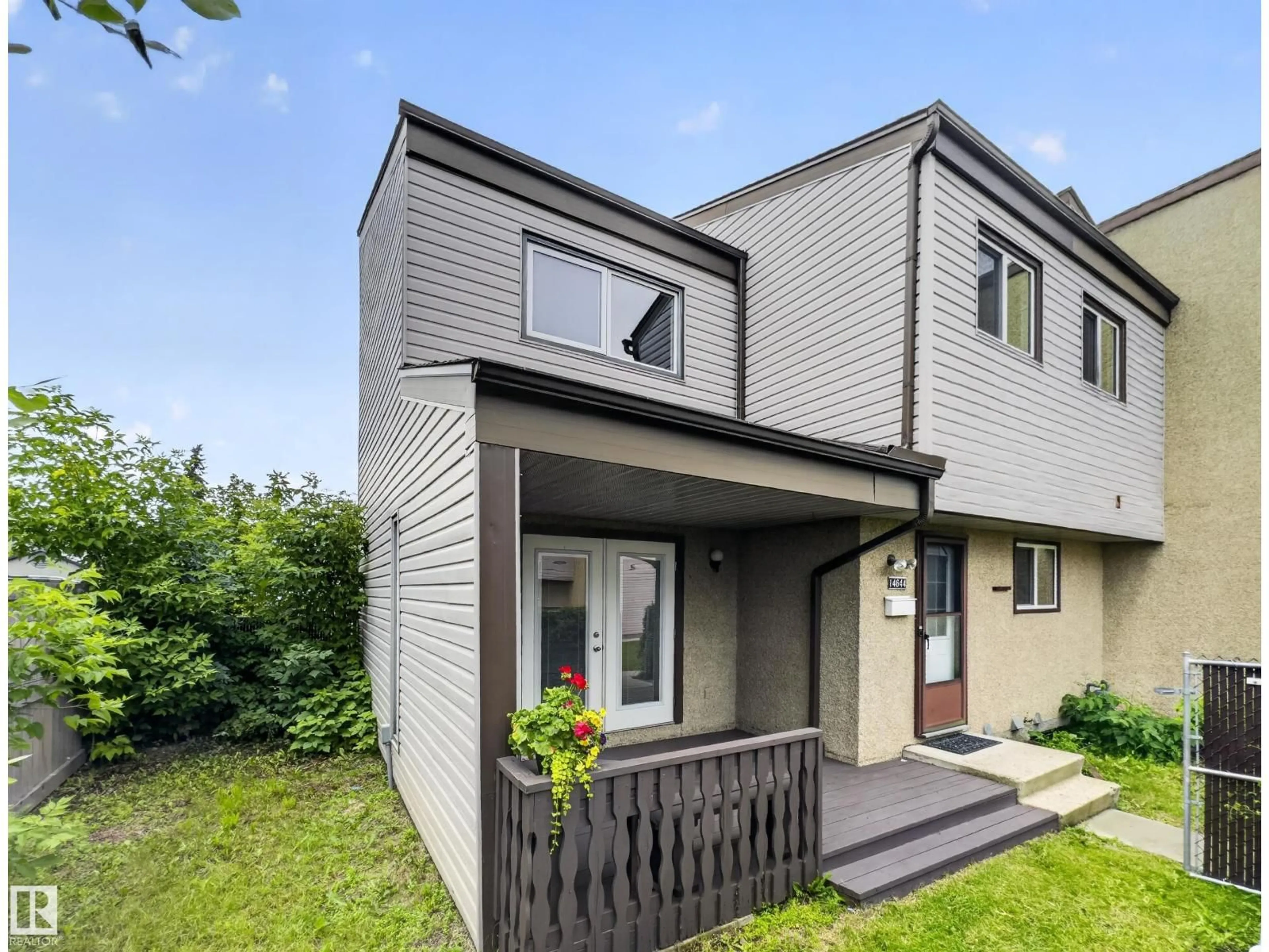 Home with vinyl exterior material, street for 14644 25 ST, Edmonton Alberta Y5Y1X4