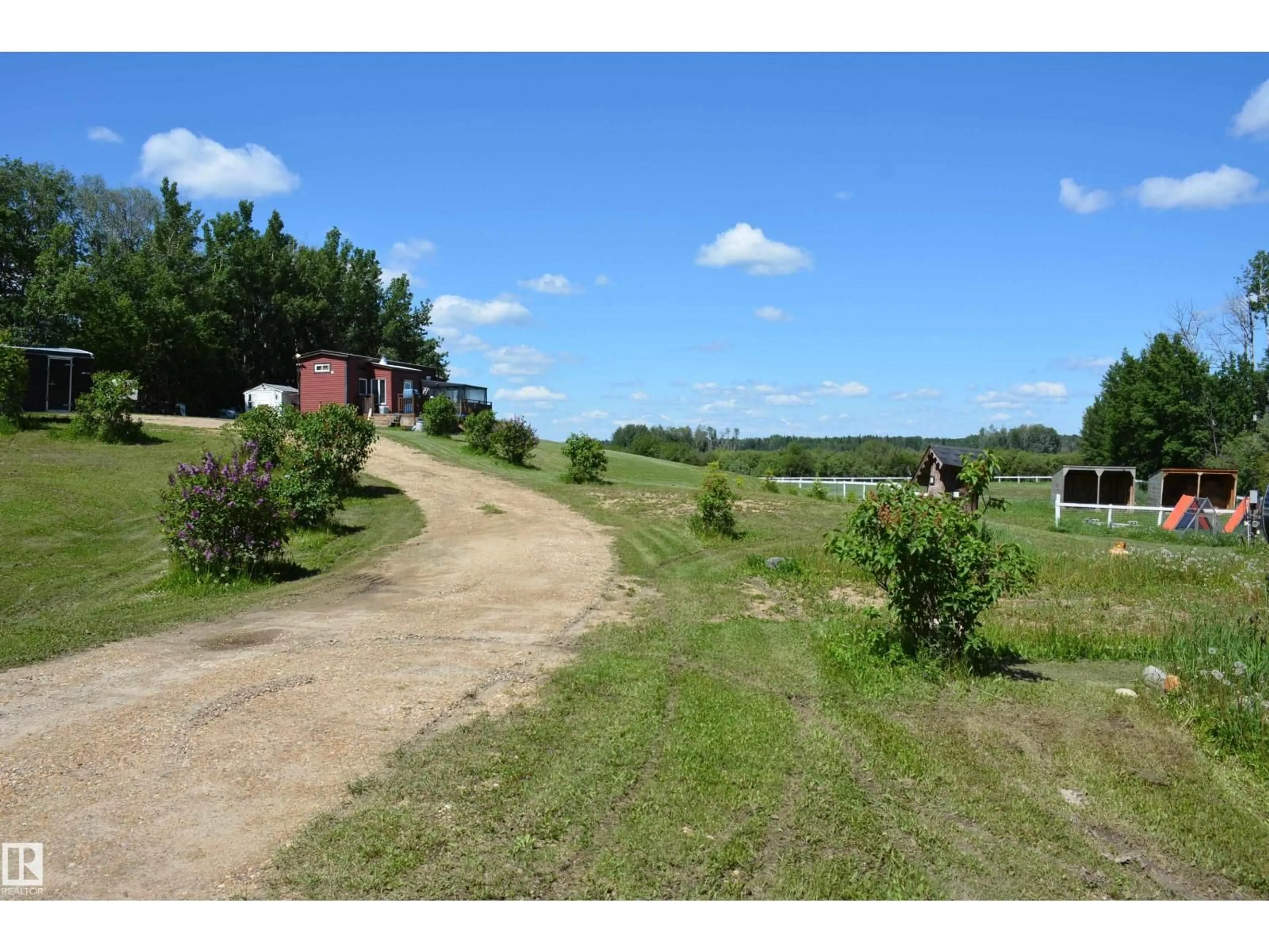 A pic from outside/outdoor area/front of a property/back of a property/a pic from drone, unknown for 5102 TWP RD 602, Rural Barrhead County Alberta T7N1A2