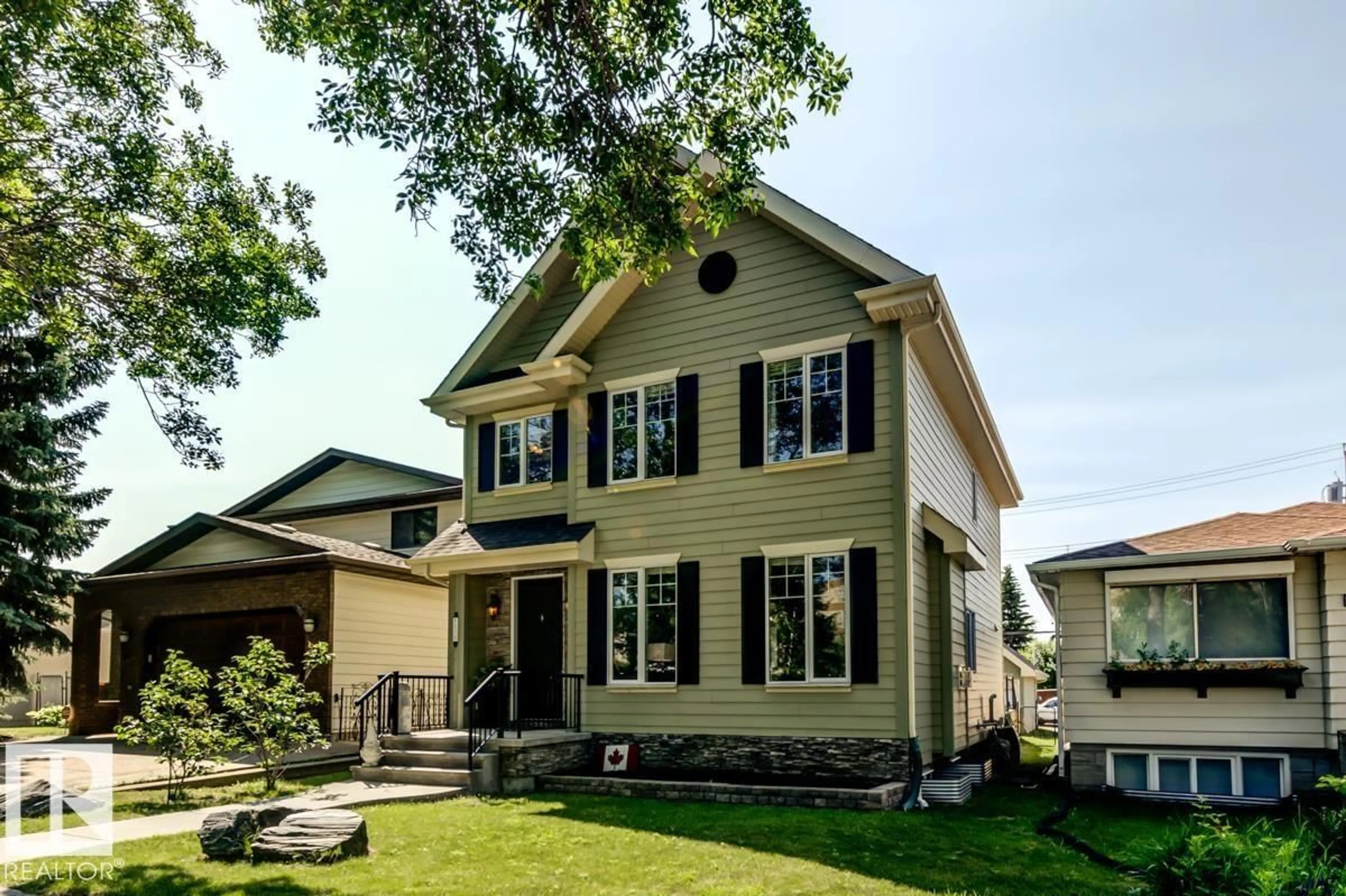 Home with vinyl exterior material, street for 8935 84 AV, Edmonton Alberta T6C1E3