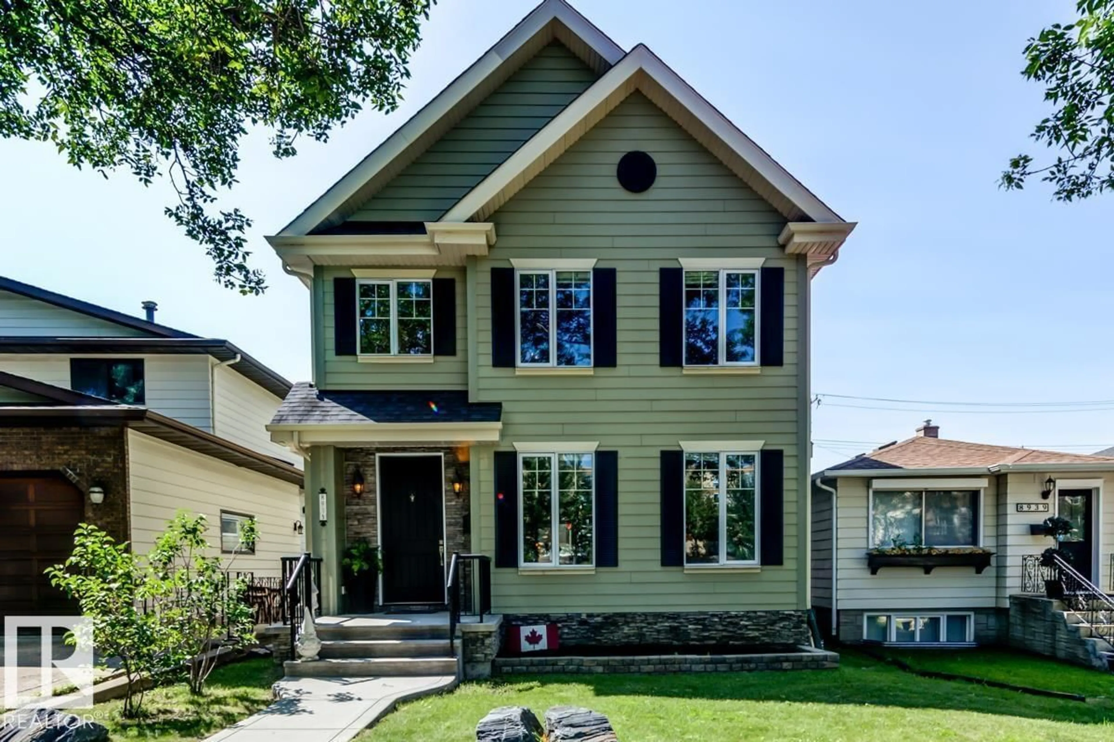 Home with vinyl exterior material, street for 8935 84 AV, Edmonton Alberta T6C1E3