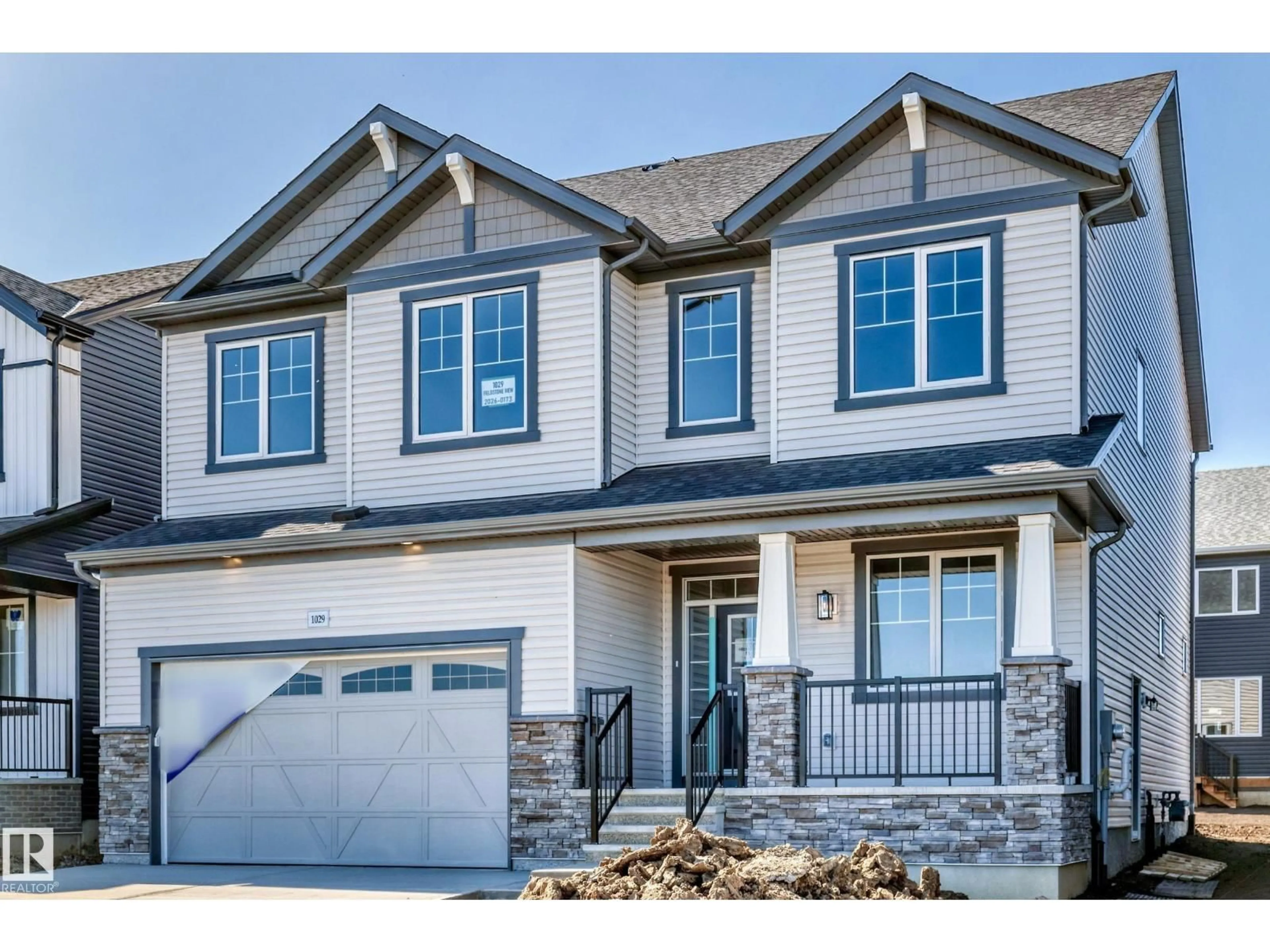 Home with vinyl exterior material, street for 1029 FIELDSTONE VW, Sherwood Park Alberta T8H3C4
