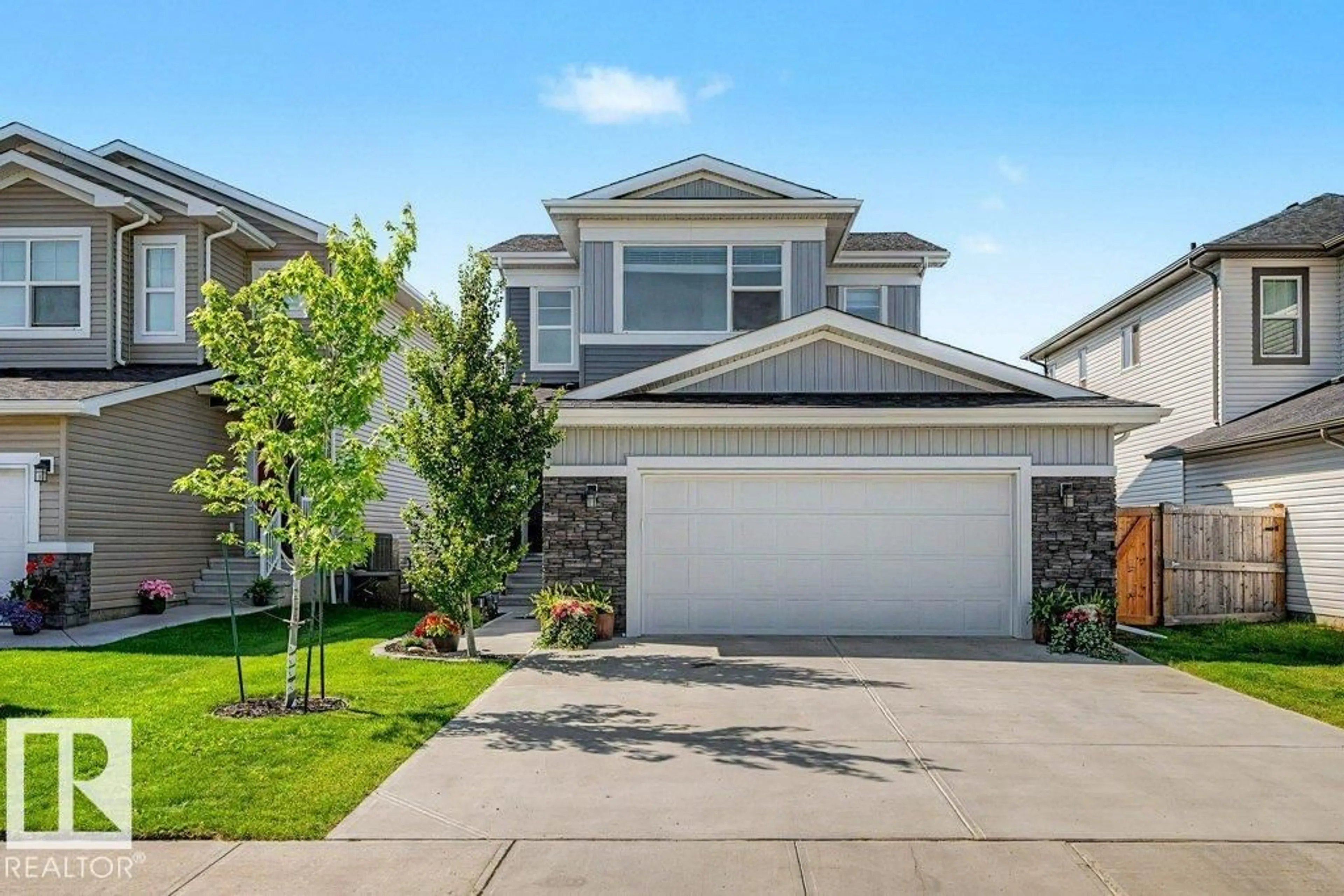 Home with vinyl exterior material, street for 243 BRICKYARD CV, Stony Plain Alberta T7Z0L1