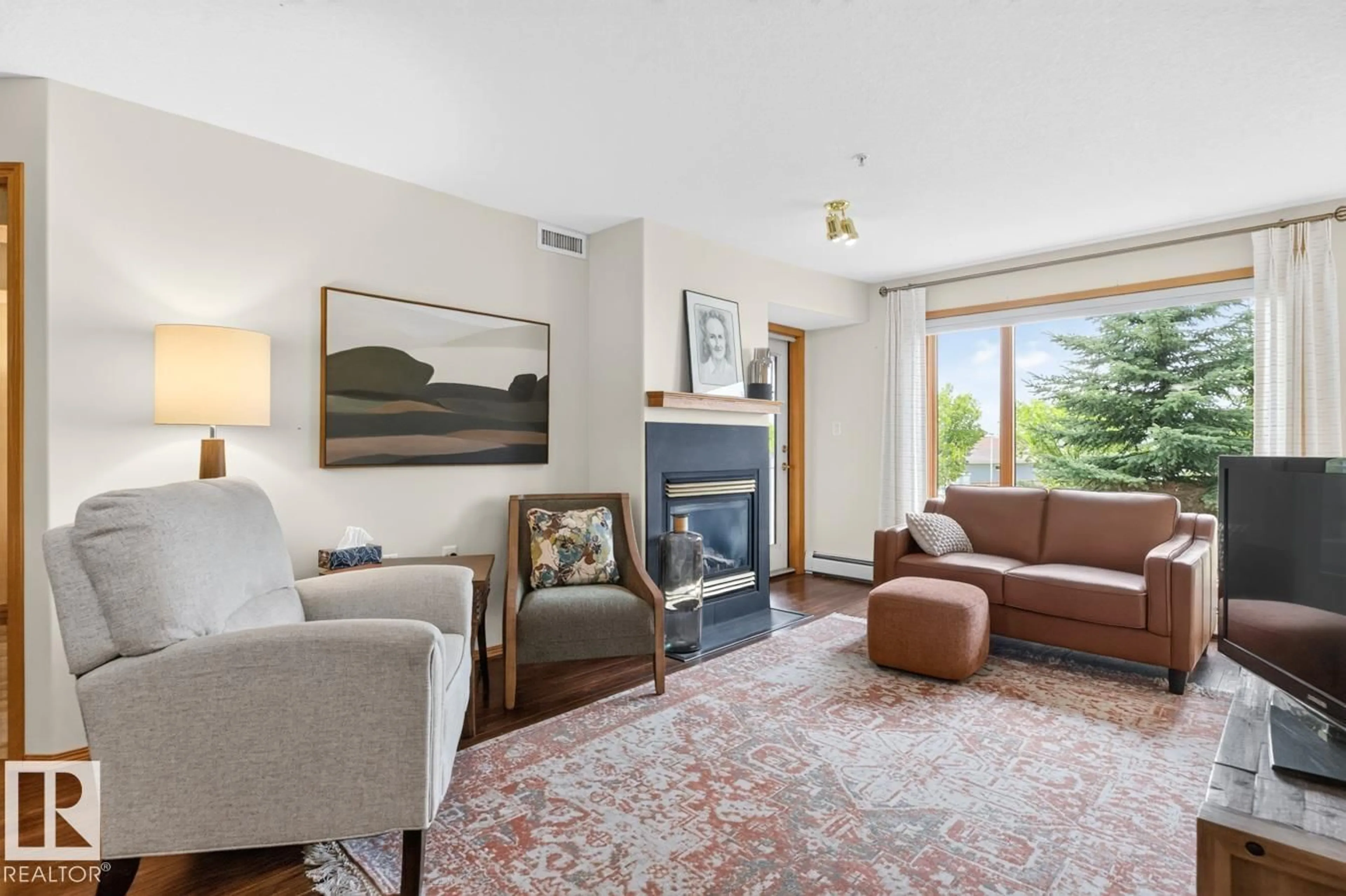 Living room with furniture, unknown for 200 - 226 BETHEL DR, Sherwood Park Alberta T8H2C5