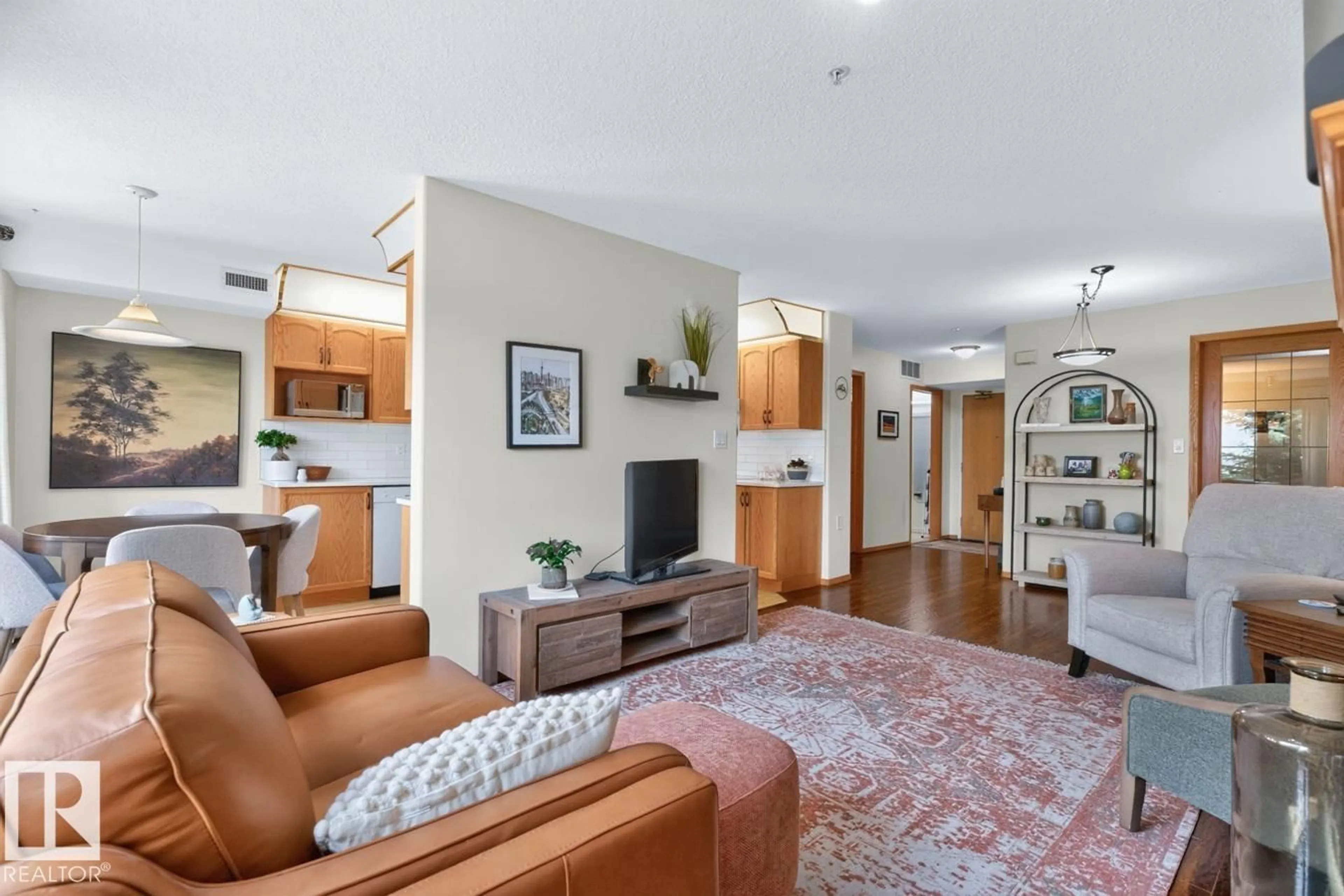 Living room with furniture, unknown for 200 - 226 BETHEL DR, Sherwood Park Alberta T8H2C5