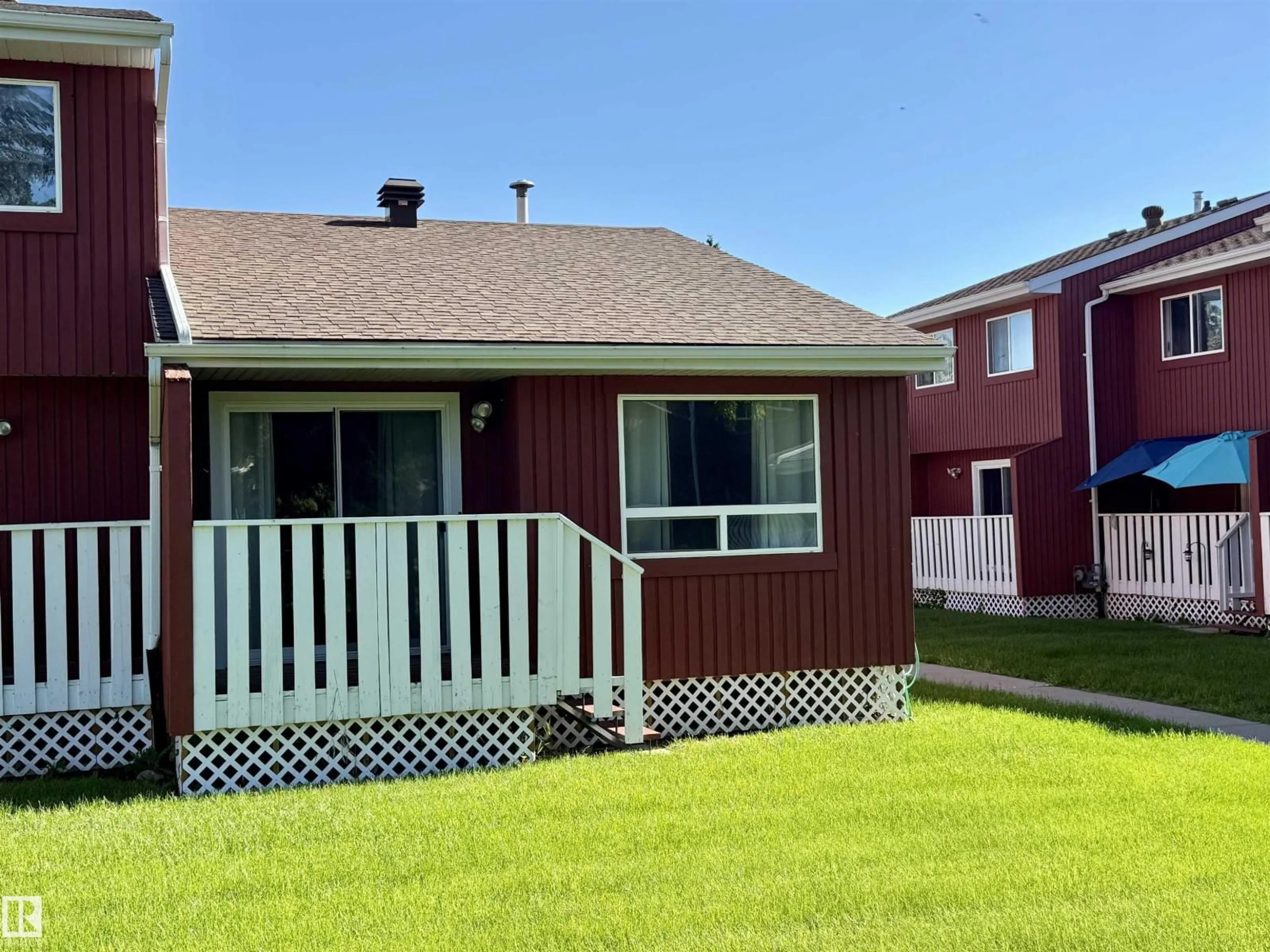 Home with vinyl exterior material, street for 10654 BEAUMARIS RD, Edmonton Alberta T5X3N4