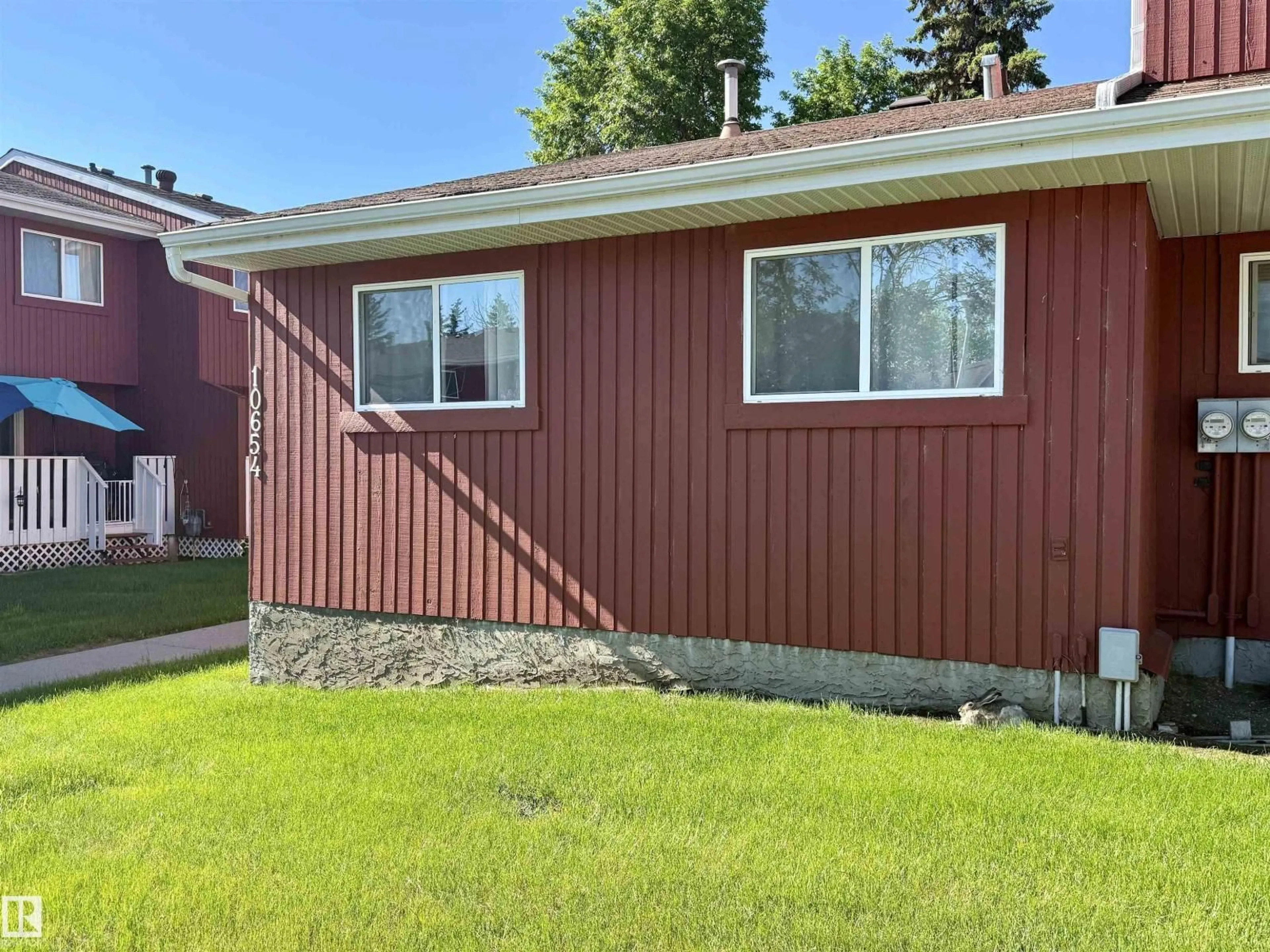 Home with vinyl exterior material, street for 10654 BEAUMARIS RD, Edmonton Alberta T5X3N4