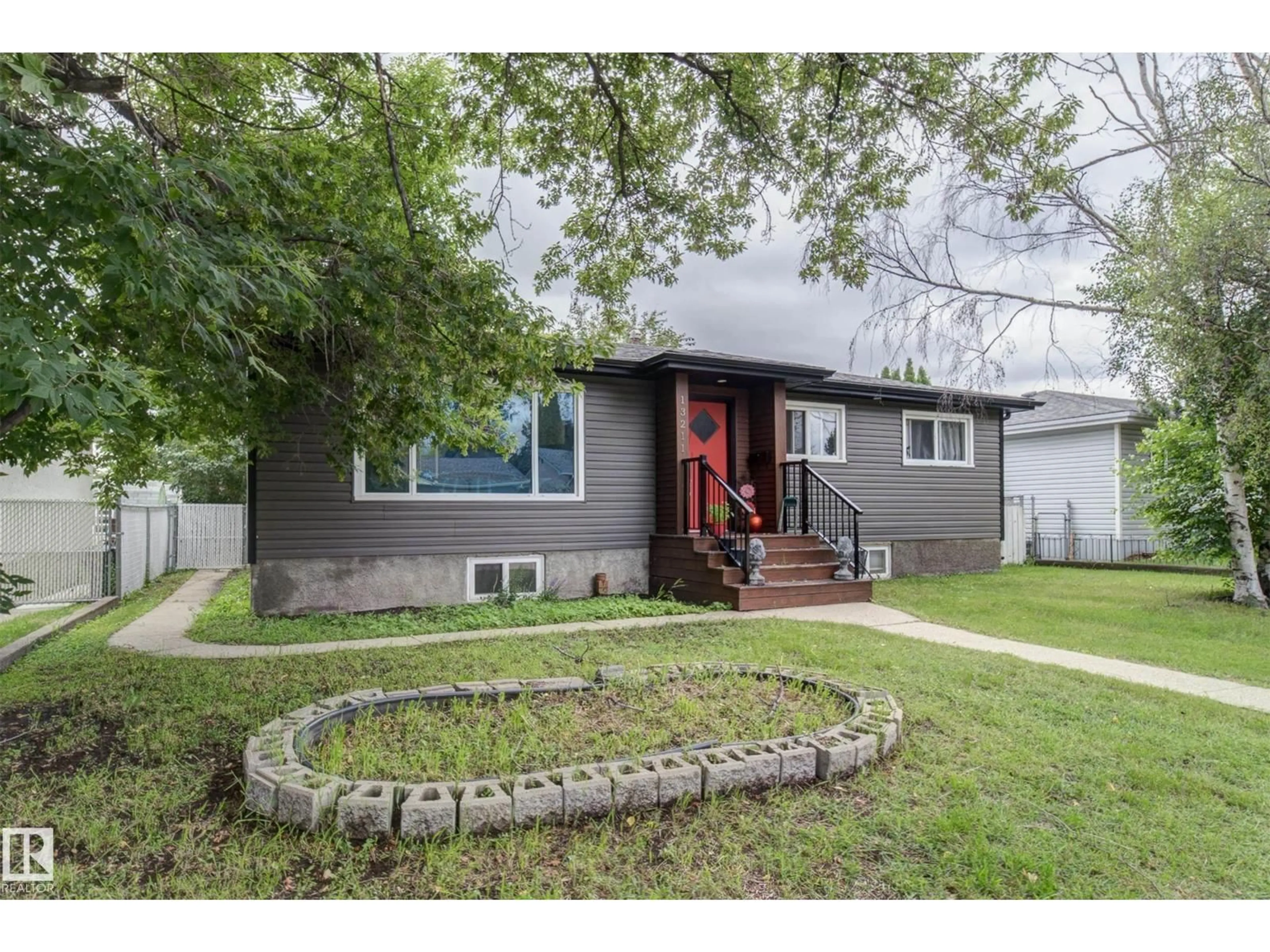 Home with vinyl exterior material, street for NW - 13211 77 ST, Edmonton Alberta T5C1C8