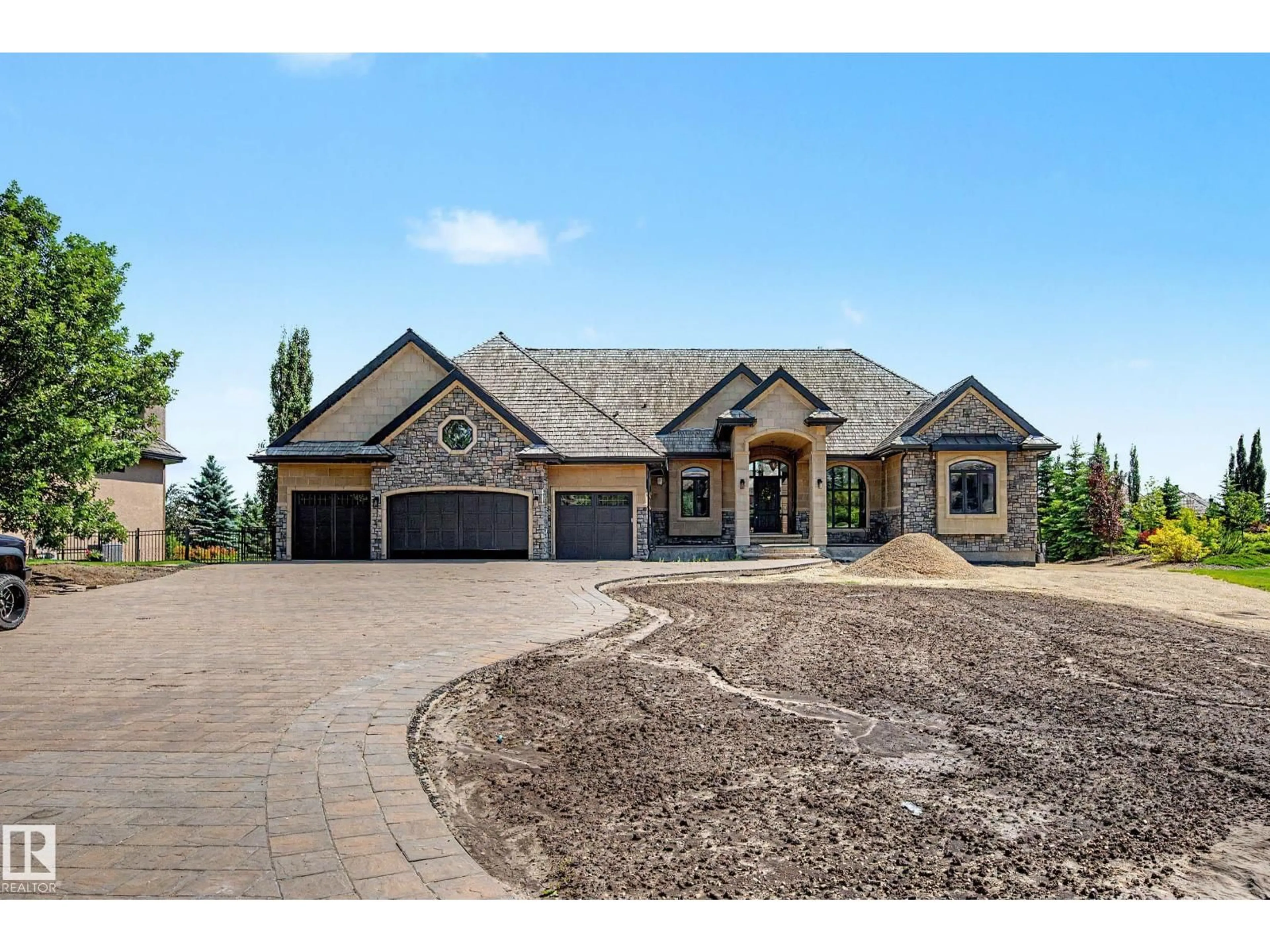 Home with brick exterior material, street for 185 RIVERSTONE DR, Rural Sturgeon County Alberta T8T0B9