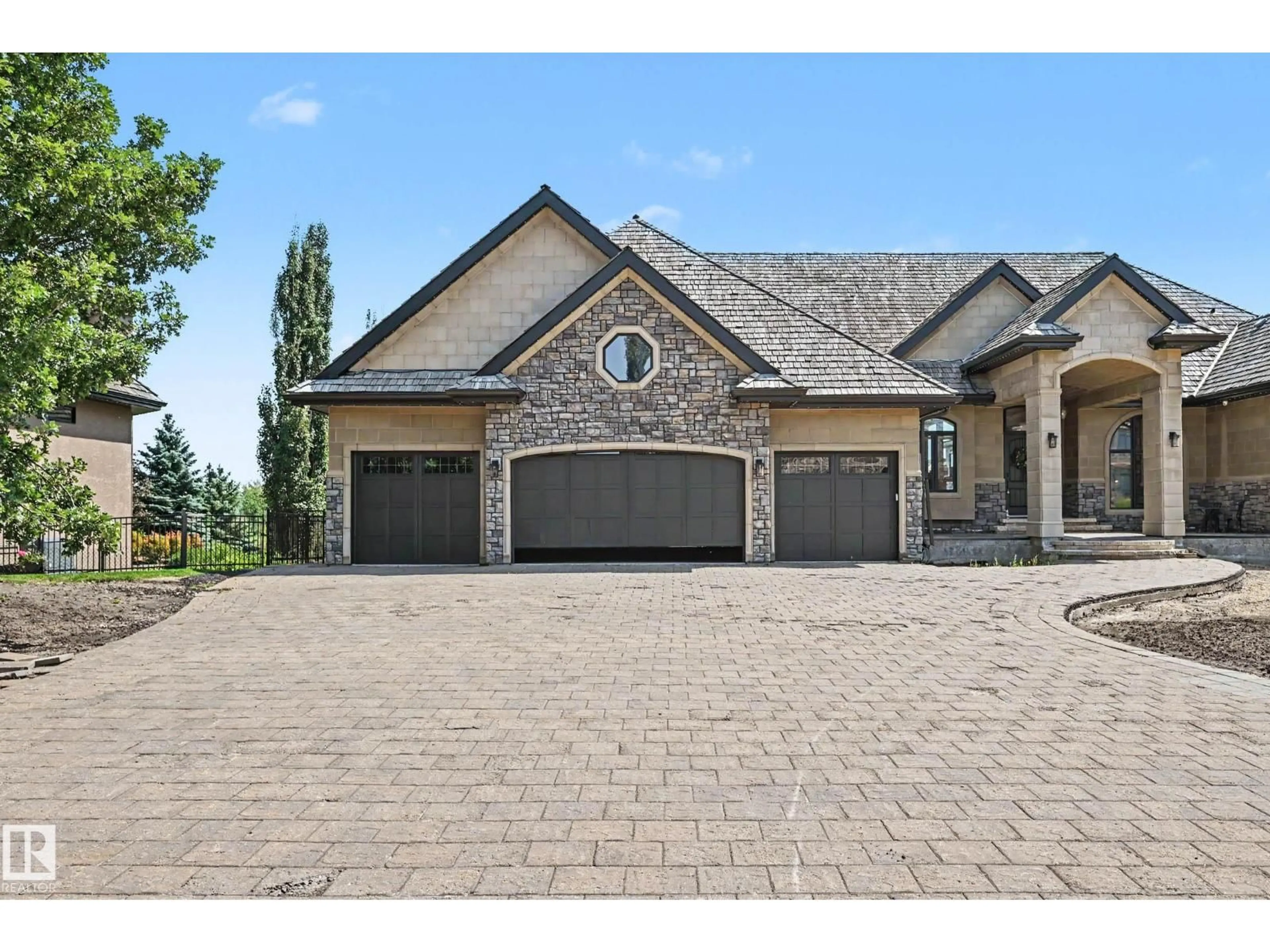 Home with brick exterior material, street for 185 RIVERSTONE DR, Rural Sturgeon County Alberta T8T0B9