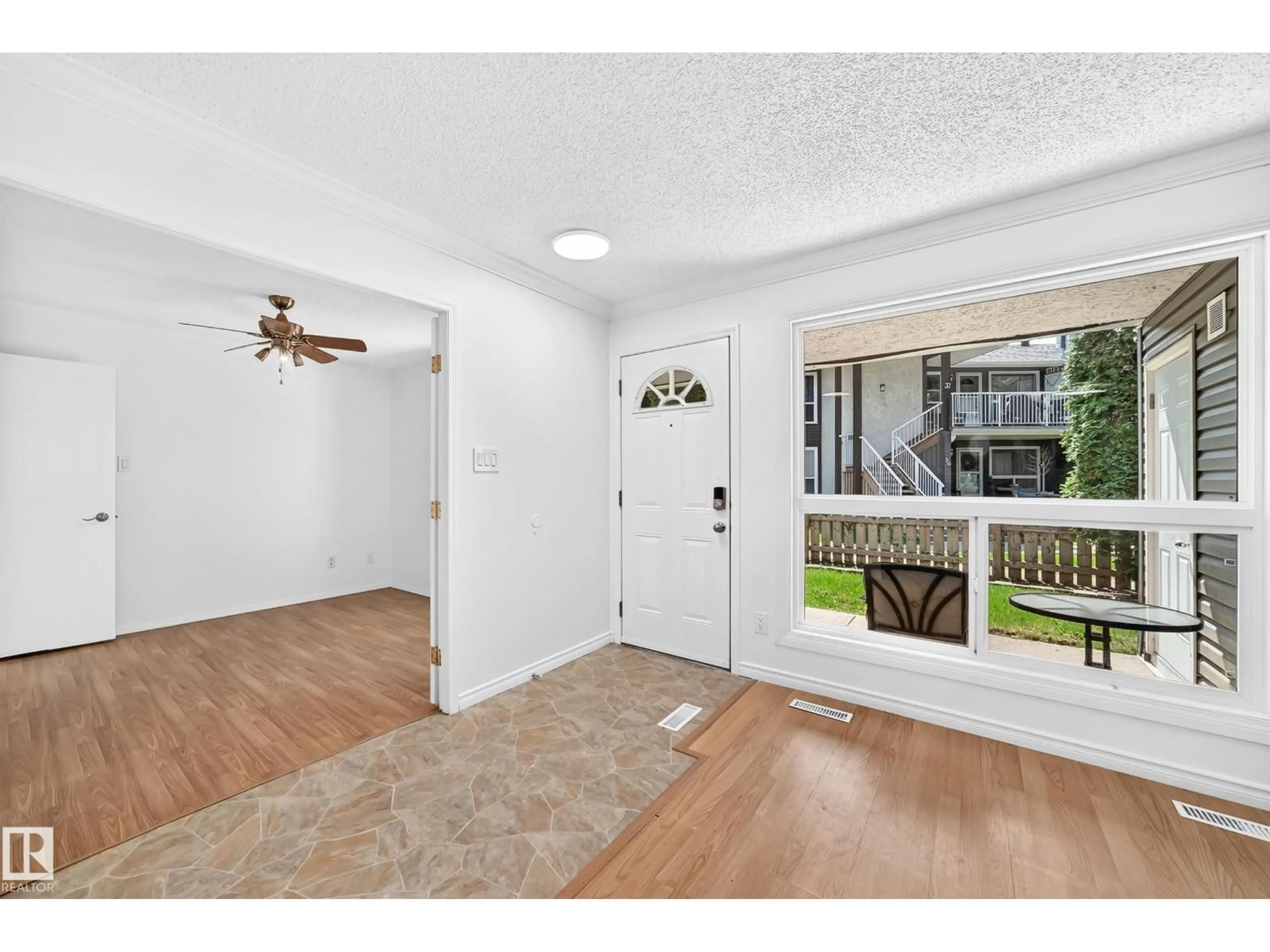 Indoor entryway for #40 - 3111 142 AV, Edmonton Alberta T5Y2H6
