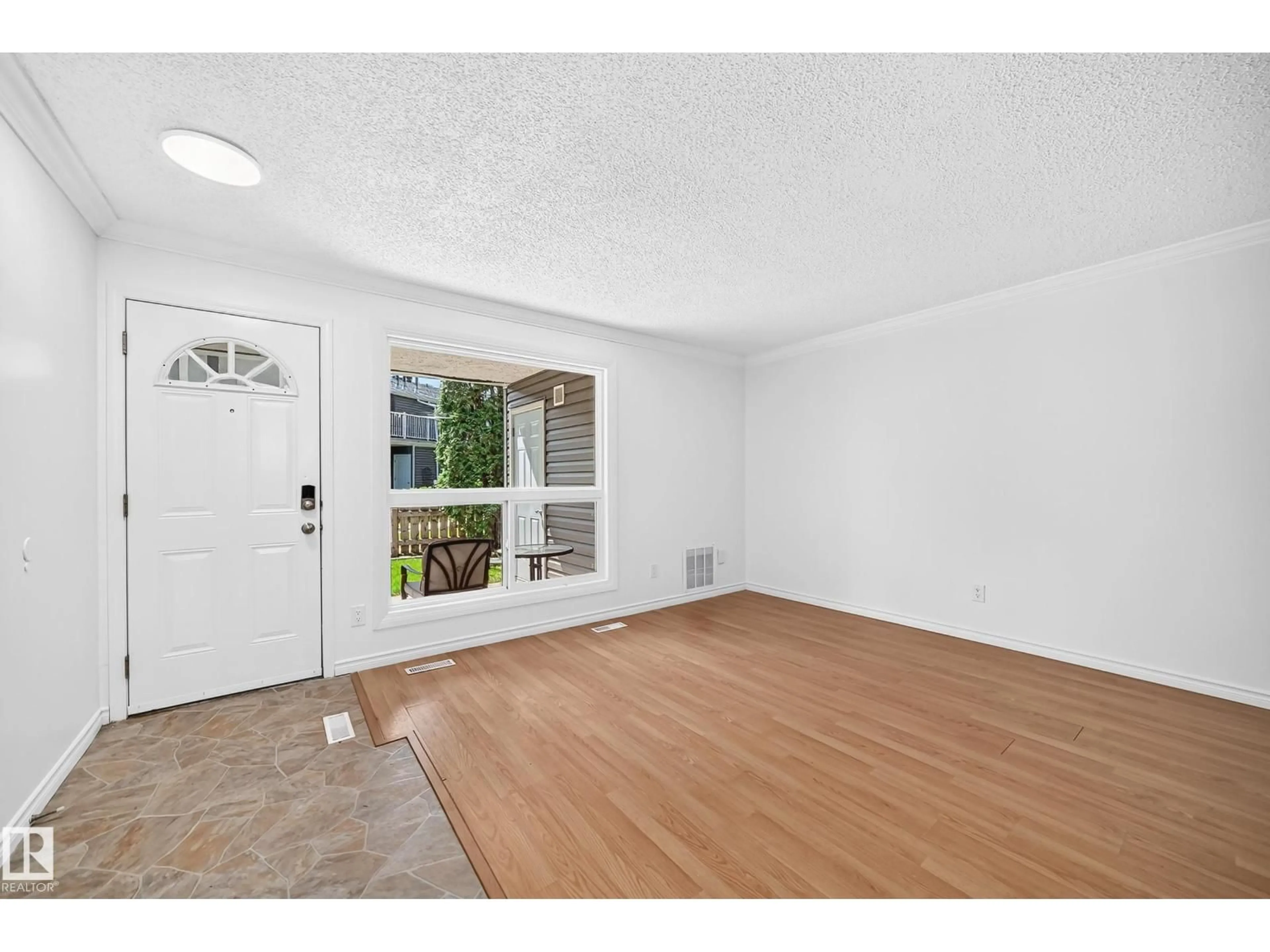 Indoor entryway for #40 - 3111 142 AV, Edmonton Alberta T5Y2H6