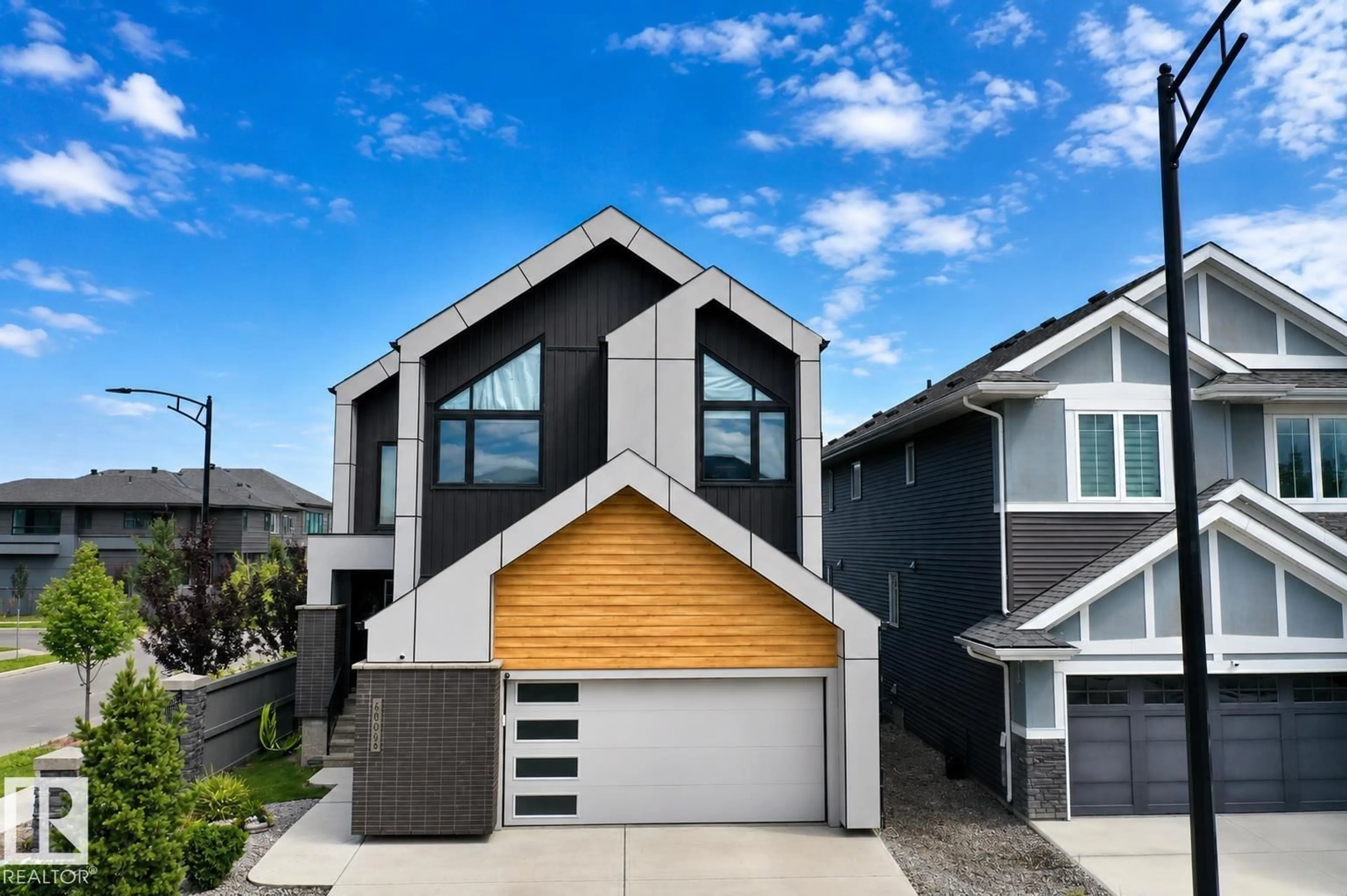 Home with vinyl exterior material, street for SW - 6805 KNOX LO, Edmonton Alberta T6W4R3