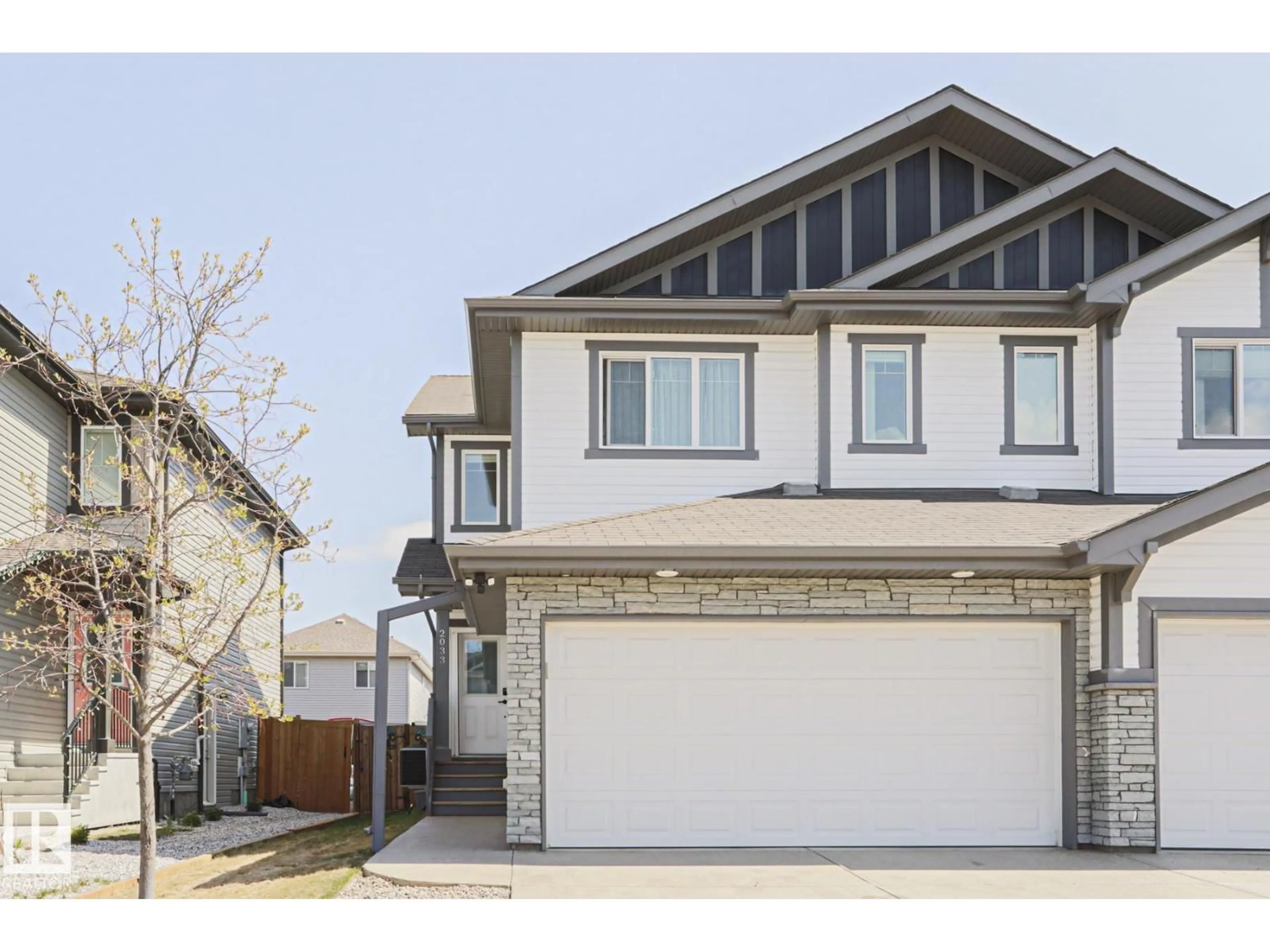Home with vinyl exterior material, street for 2033 WESTERRA LO, Stony Plain Alberta T7Z0H8