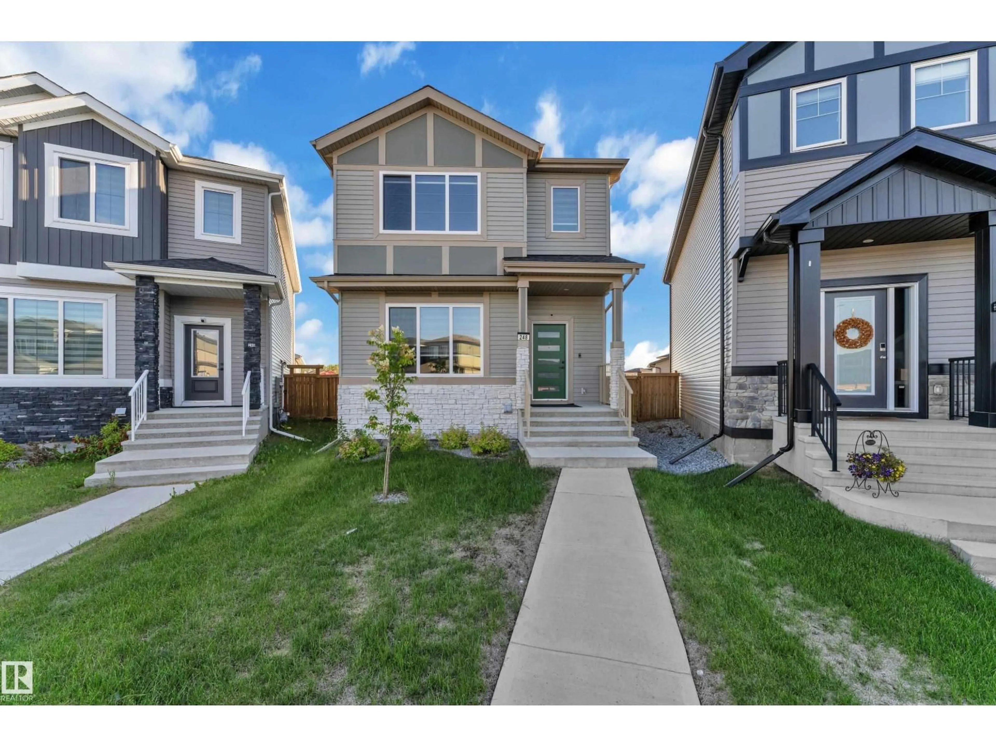 Home with vinyl exterior material, street for 248 ROLSTON WD, Leduc Alberta T9E1N1
