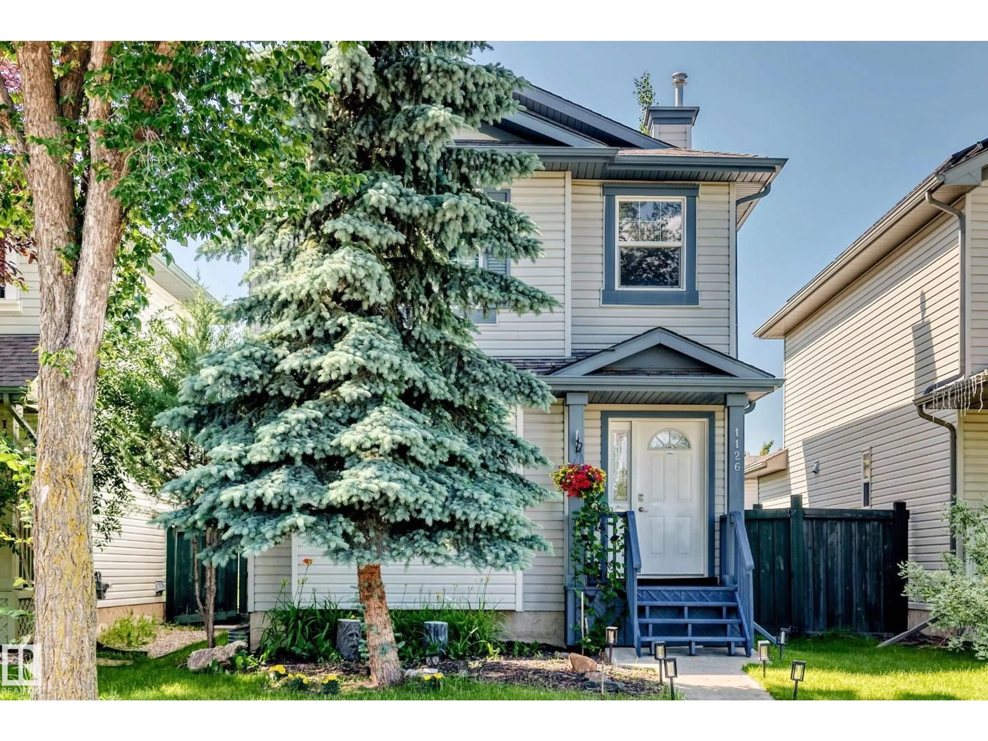 Home with vinyl exterior material, street for 1126 GRANTHAM DR, Edmonton Alberta T5T6L1