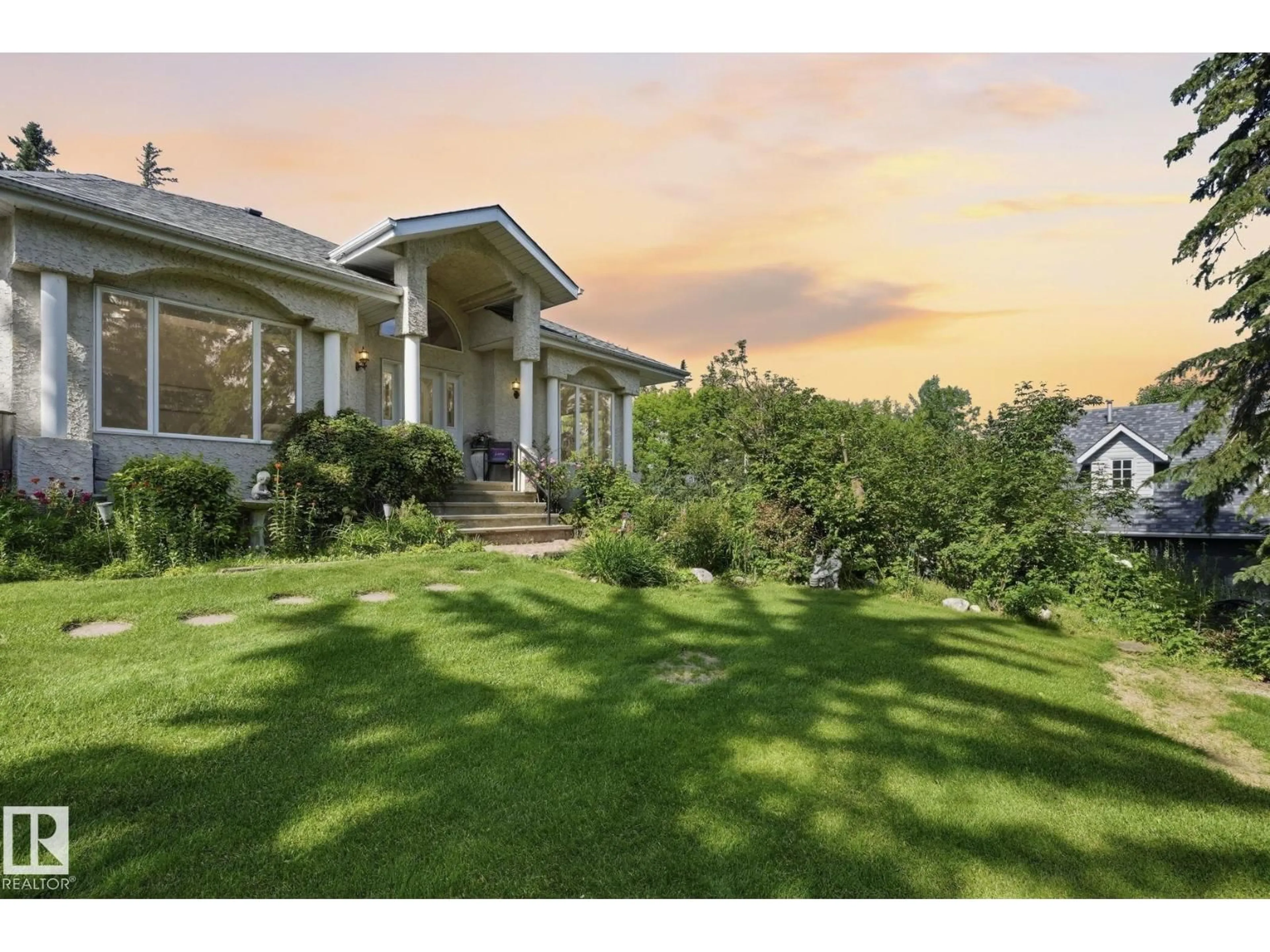 A pic from outside/outdoor area/front of a property/back of a property/a pic from drone, mountain view for 9 MARTIN RD, Rural Lac Ste. Anne County Alberta T0E1A0