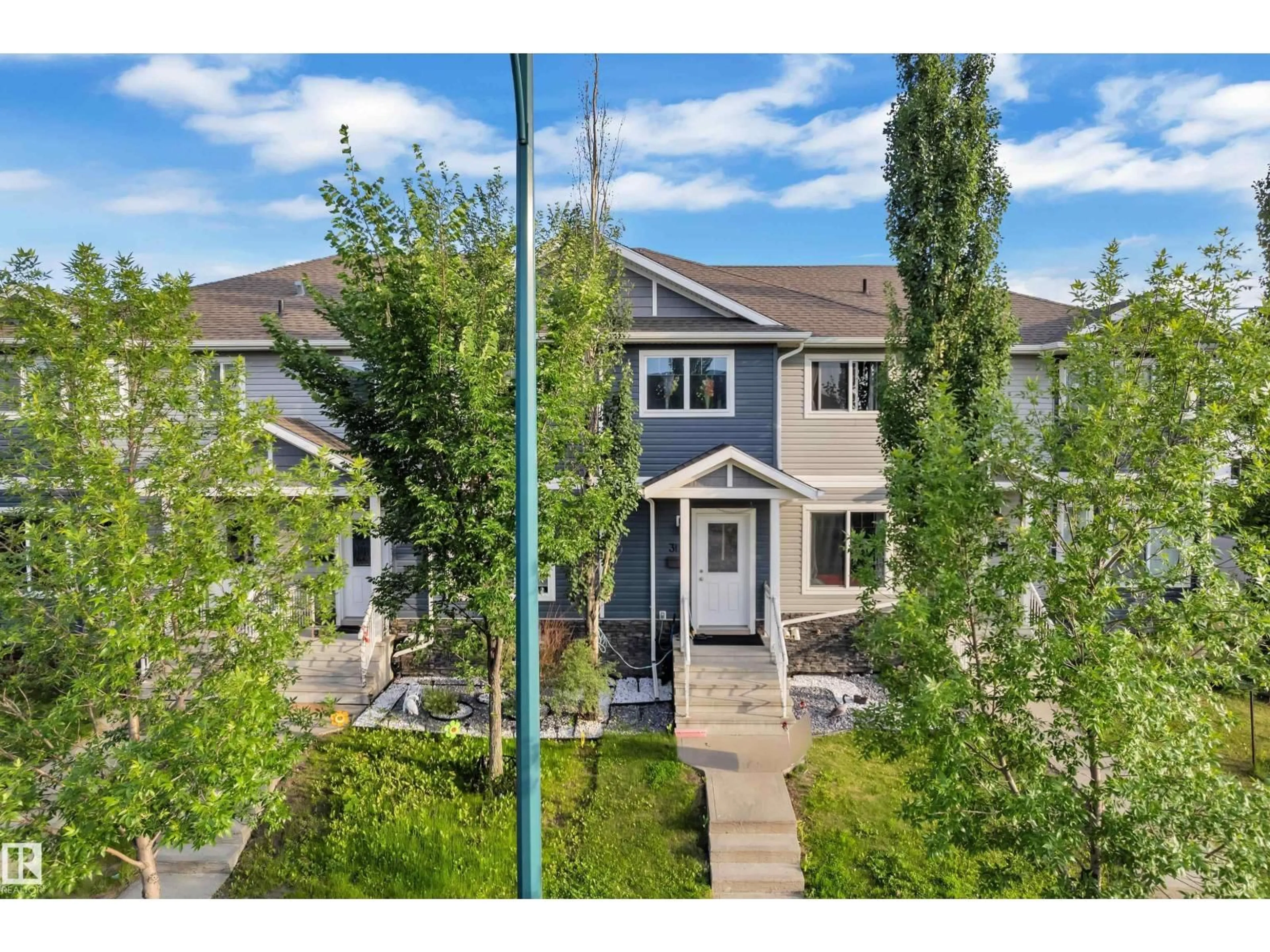 A pic from outside/outdoor area/front of a property/back of a property/a pic from drone, street for 3127 16 AV, Edmonton Alberta T6T0P7