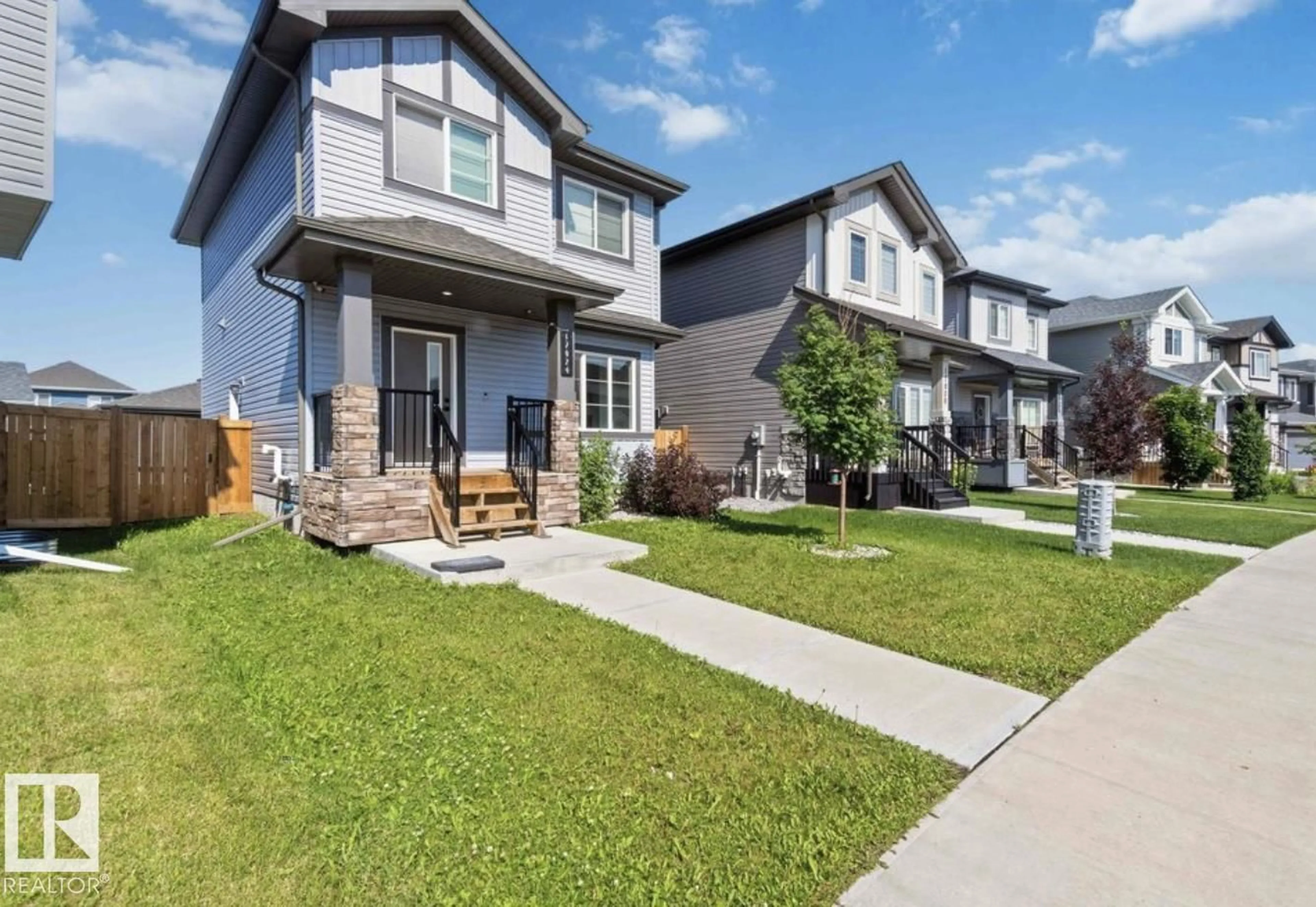 Home with vinyl exterior material, street for 17924 61 STREET, Edmonton Alberta T5Y3X1