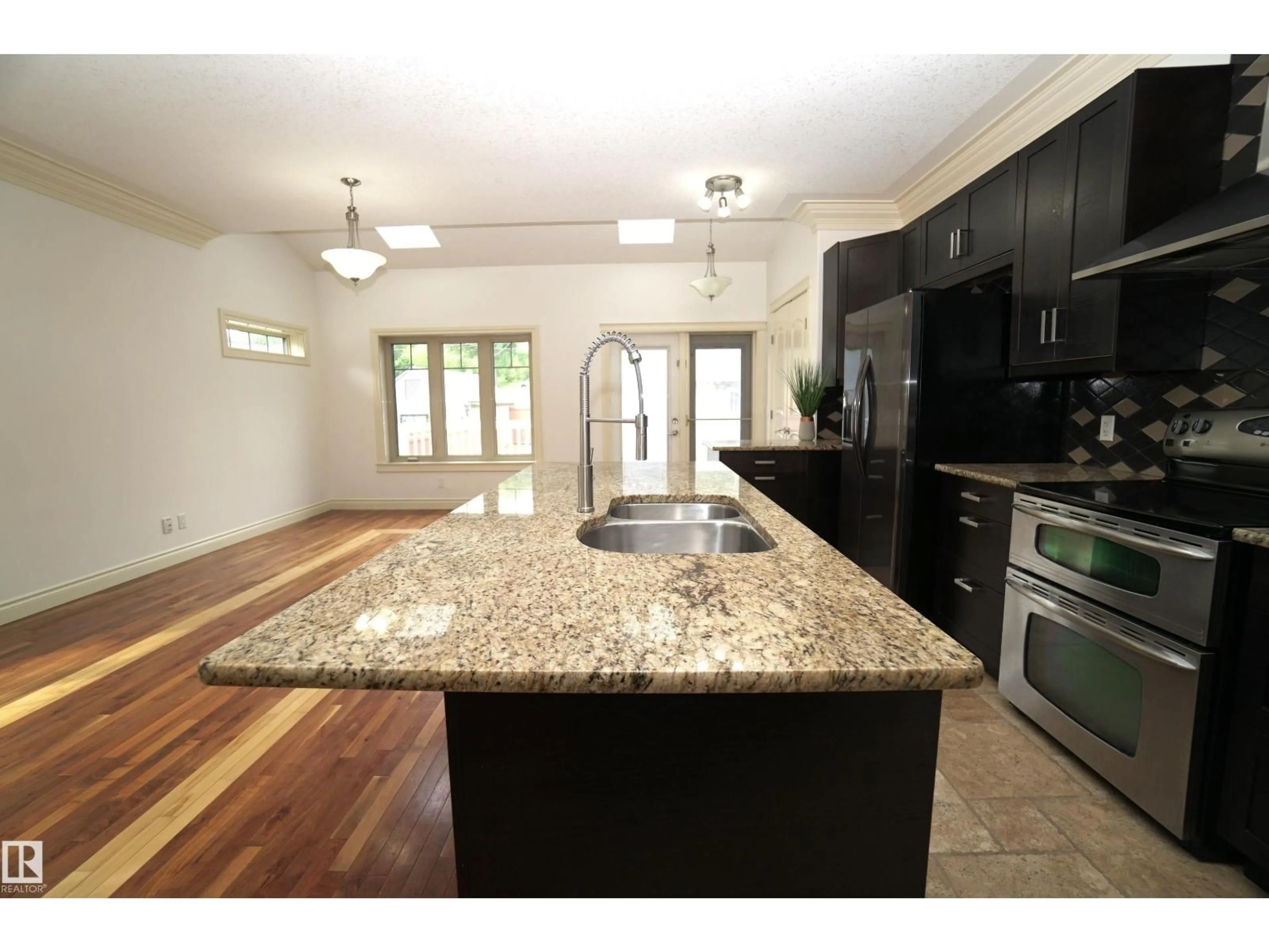 Open concept kitchen, unknown for 10224 90 ST, Edmonton Alberta T5H1S1