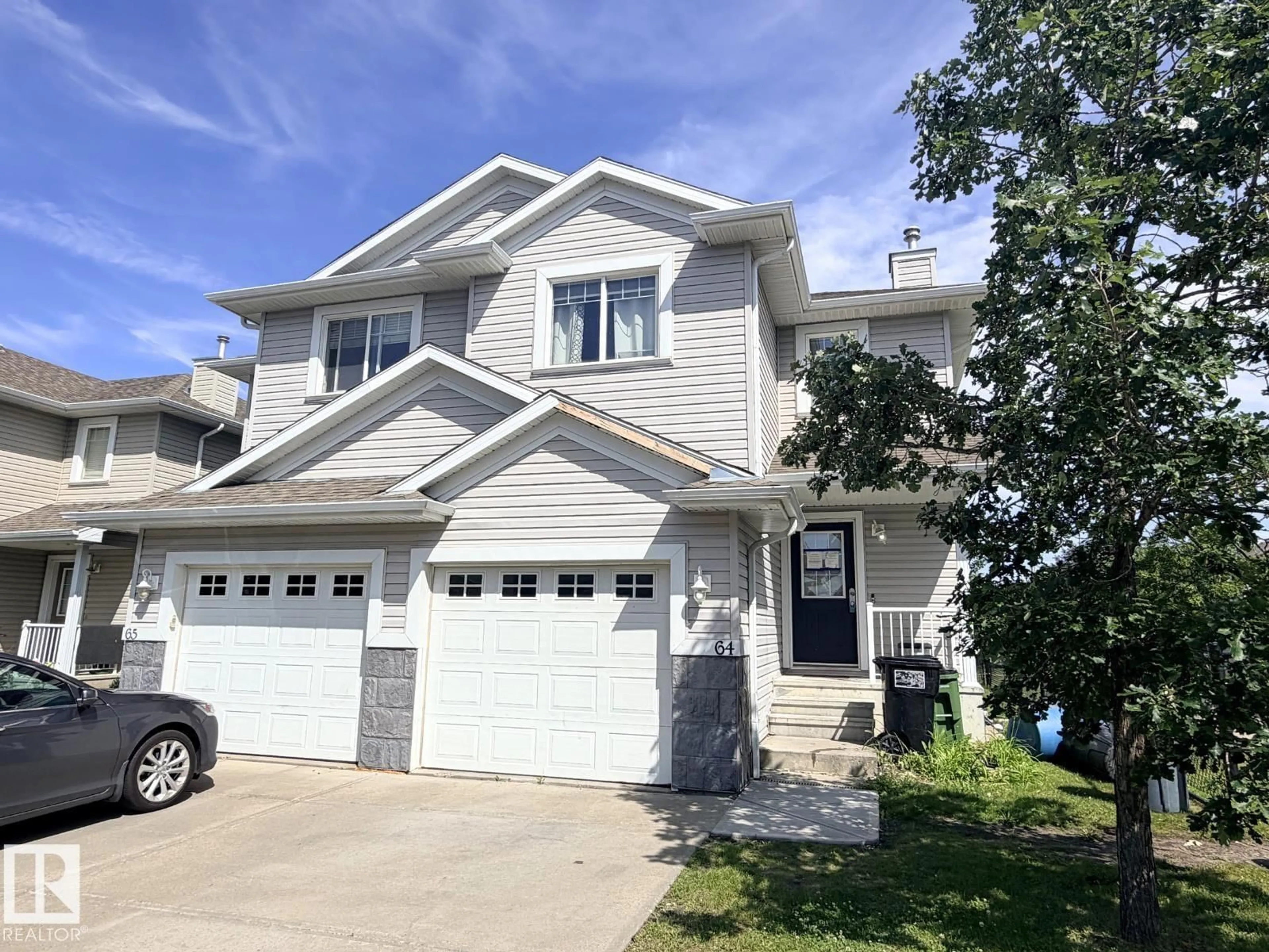 Home with vinyl exterior material, street for 120 - 64 MAGRATH RD, Edmonton Alberta T6R0C6