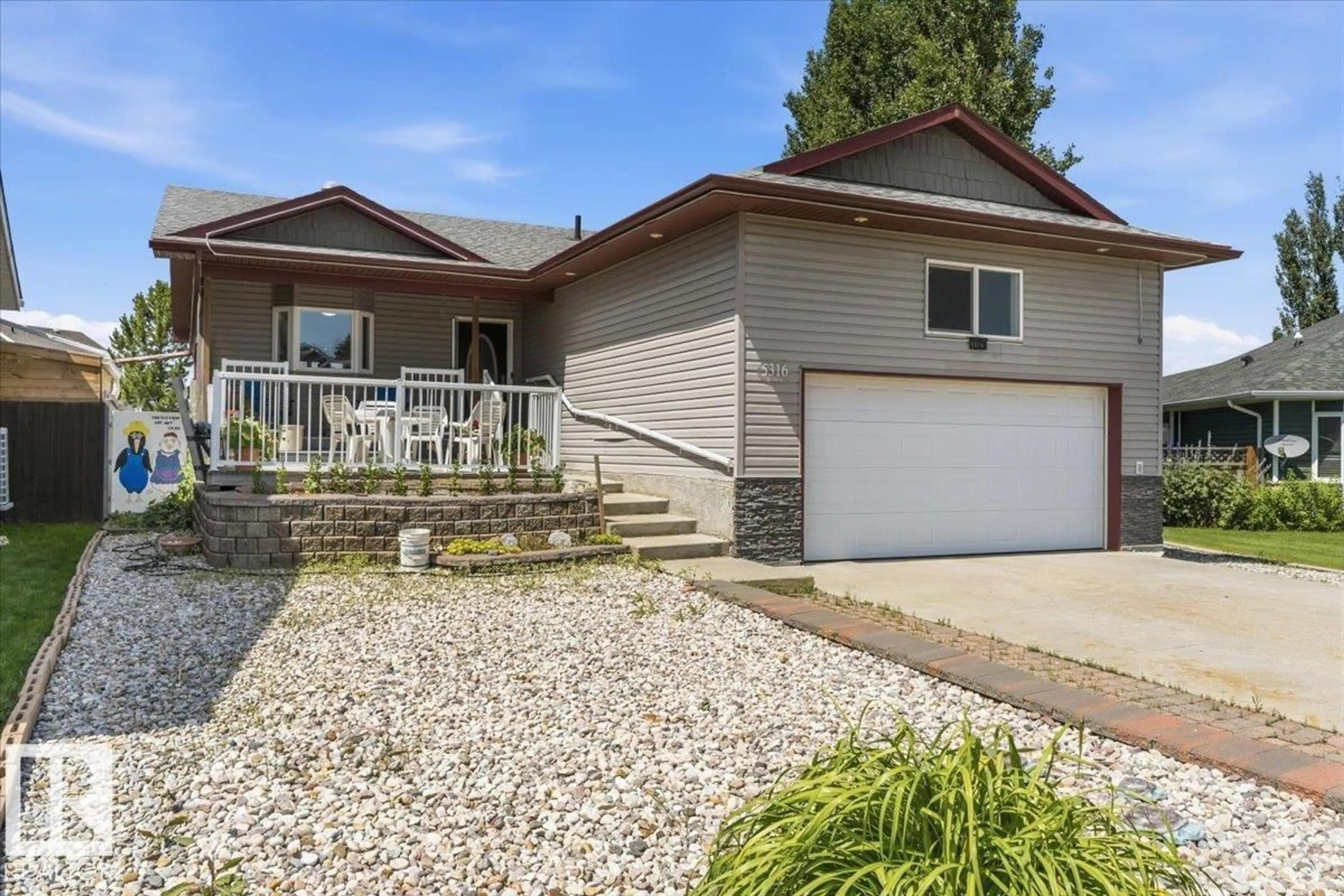 Home with vinyl exterior material, street for 5316 53 ST, Tofield Alberta T0B4J0