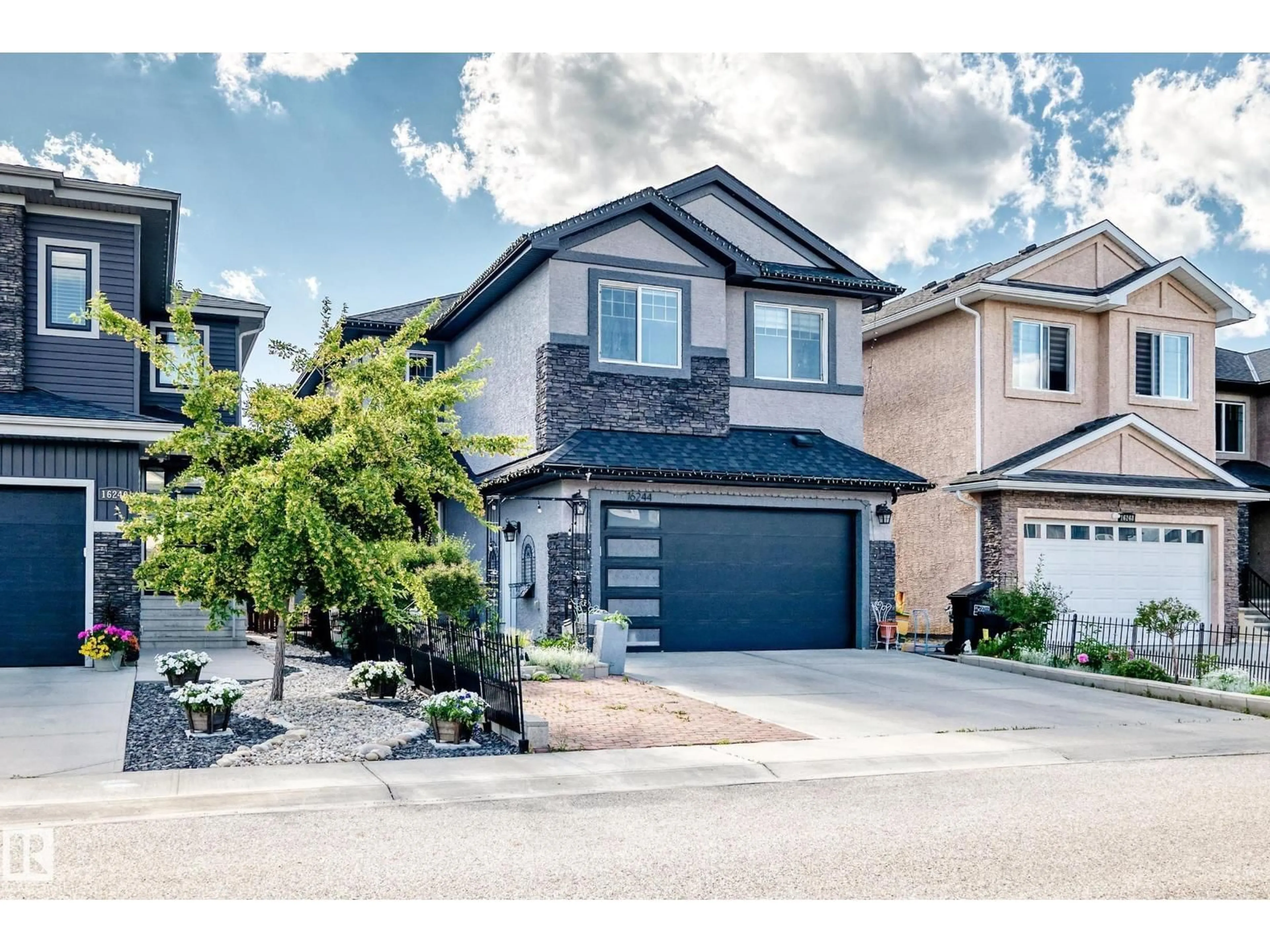 Home with vinyl exterior material, street for NW - 16244 138 ST, Edmonton Alberta T6V0J8