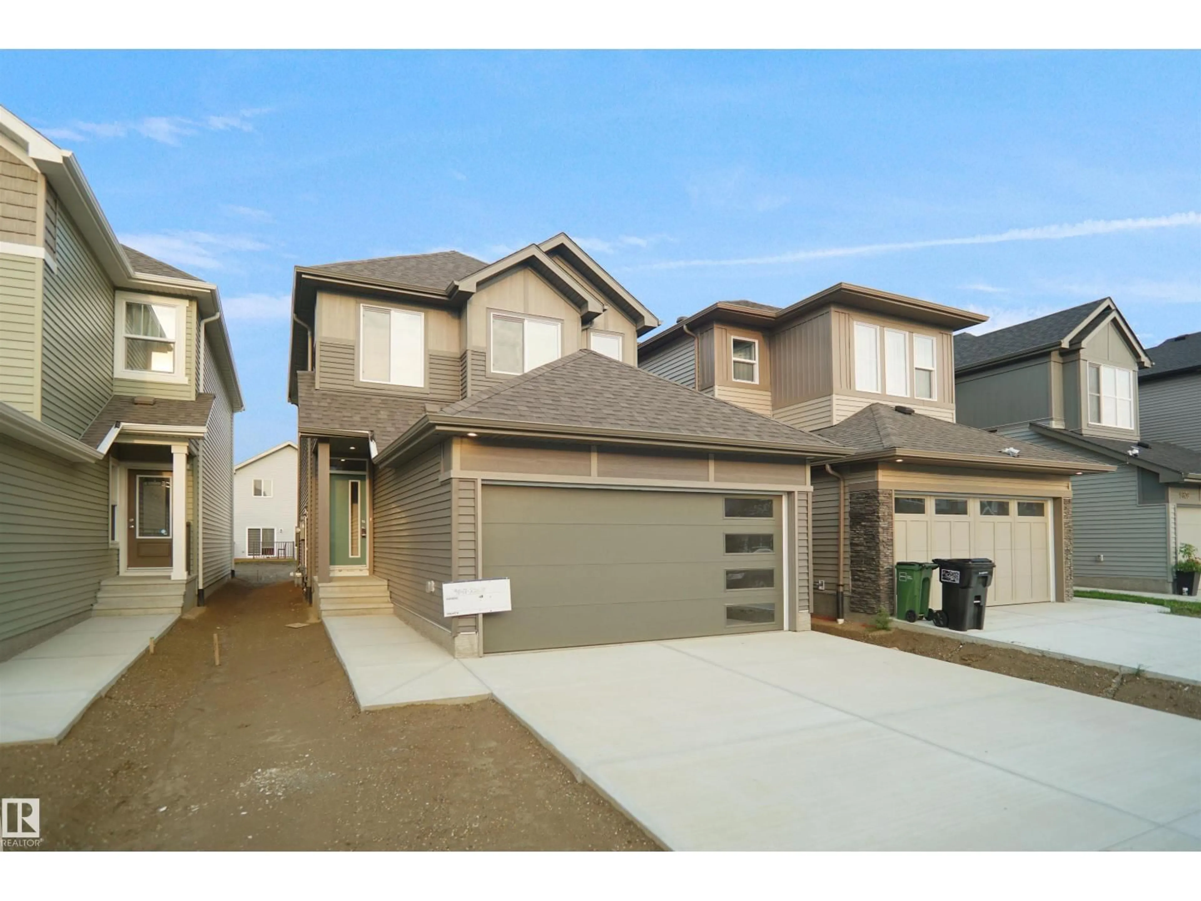 Home with vinyl exterior material, street for SW - 12127 34 AV, Edmonton Alberta T6W5E9