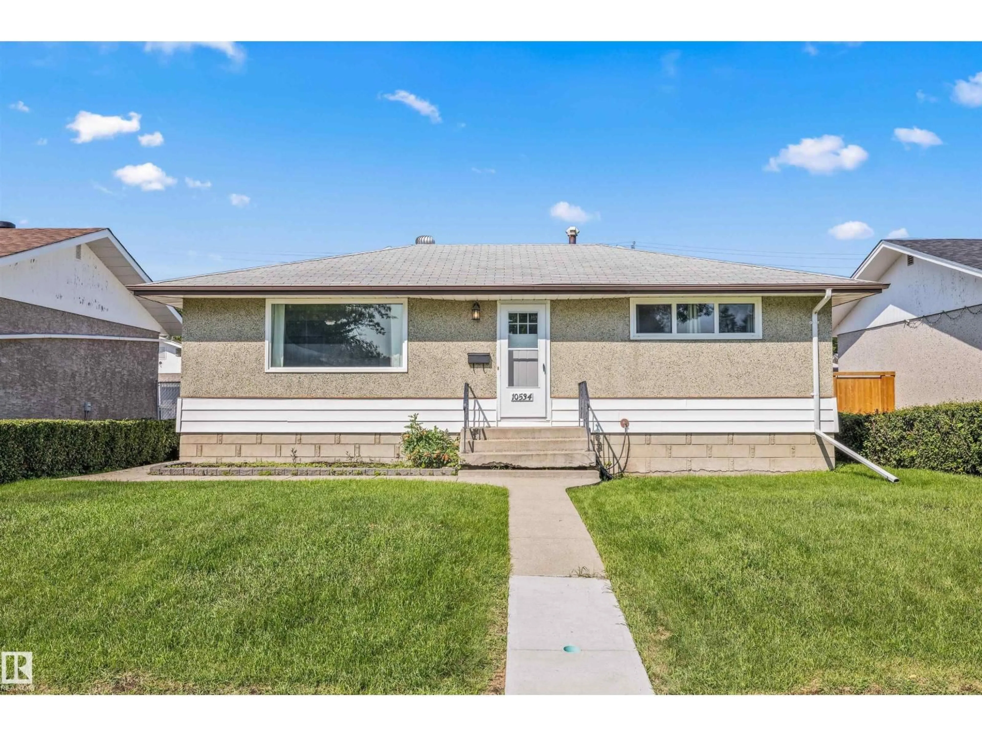 Home with vinyl exterior material, street for NW - 10534 163 ST, Edmonton Alberta T5P3P1