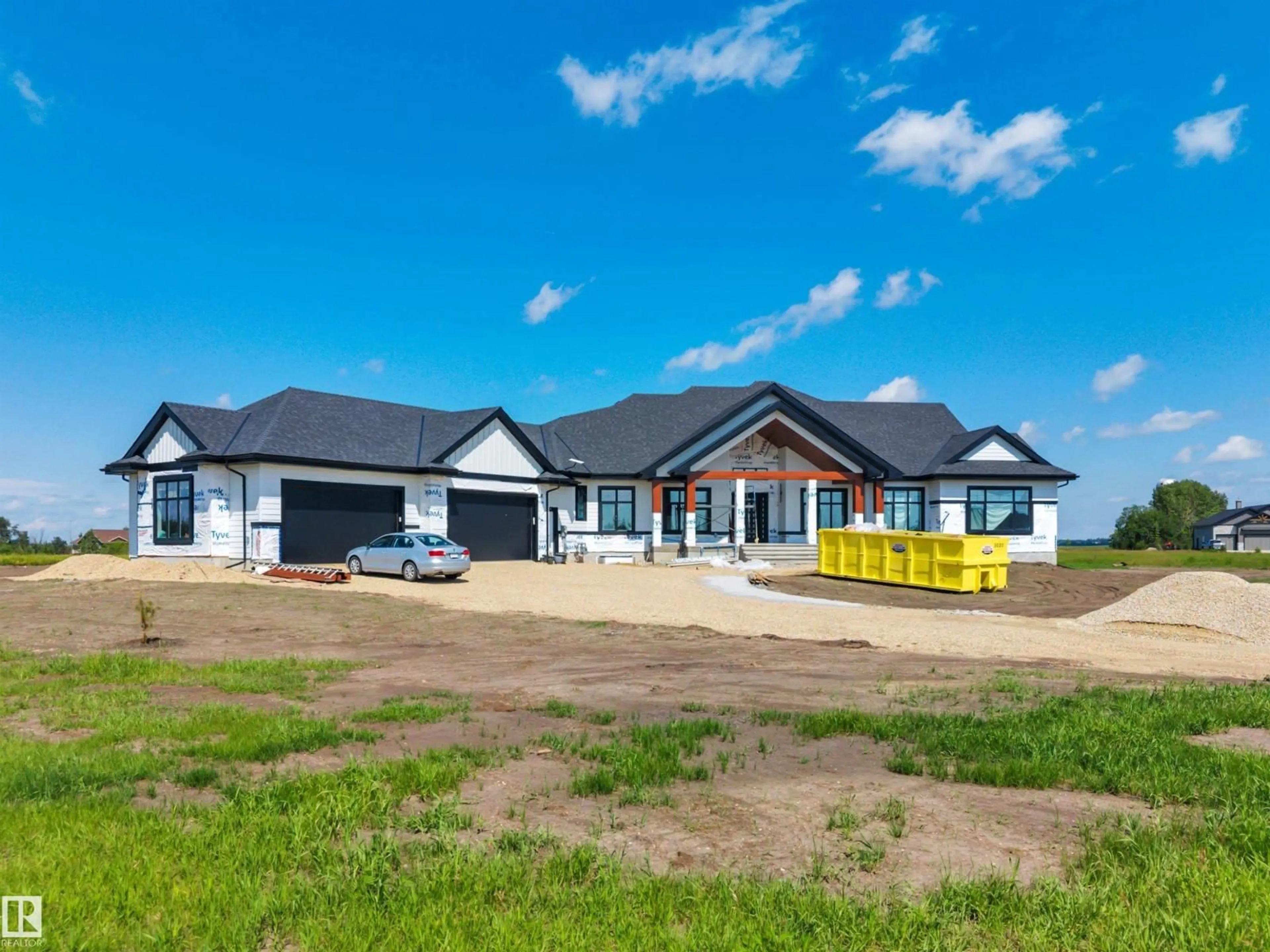 A pic from outside/outdoor area/front of a property/back of a property/a pic from drone, building for 49023 - 20 RGE RD 250, Rural Leduc County Alberta T9E2B9