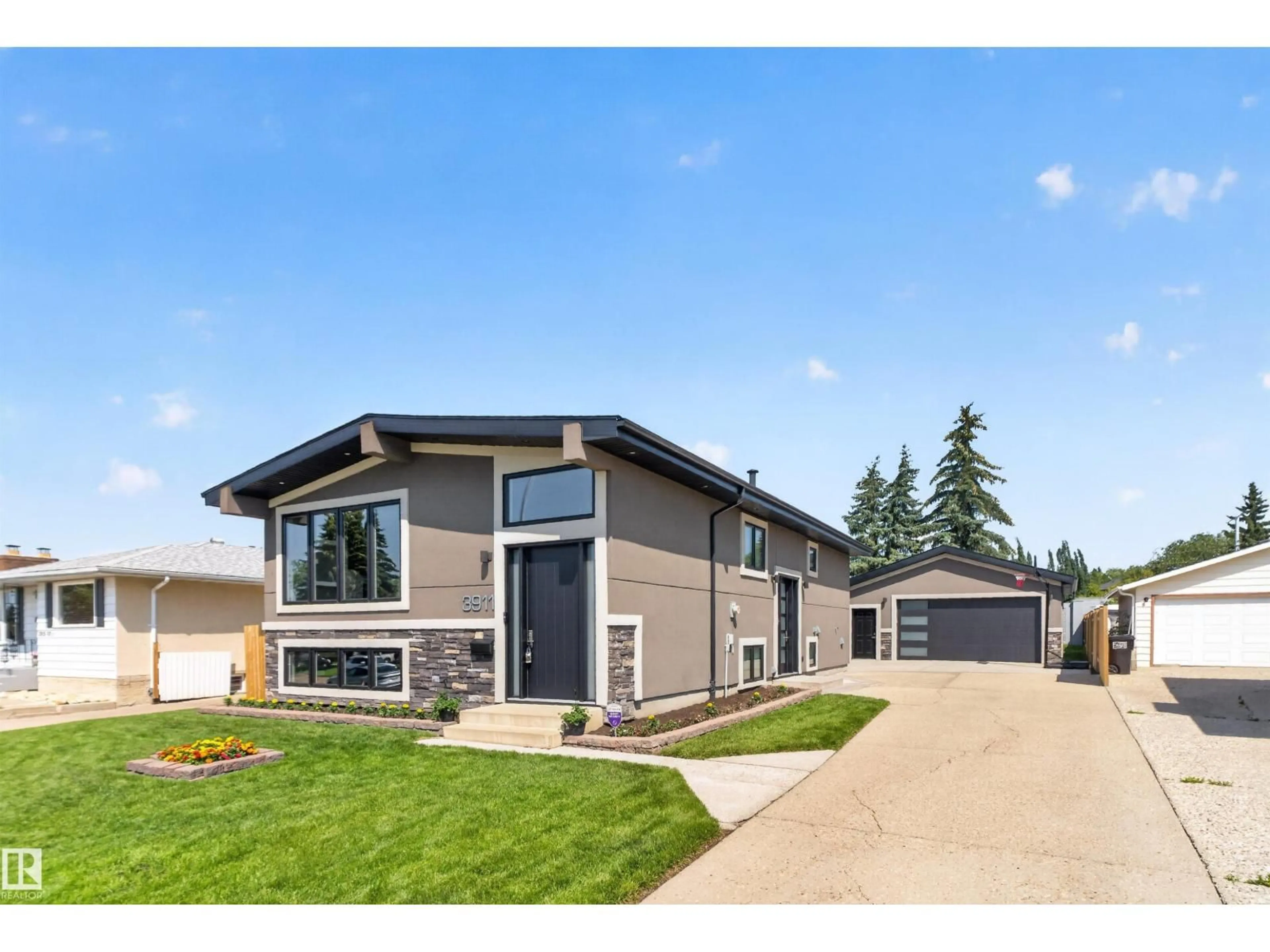 Home with vinyl exterior material, street for 3911 67 ST, Edmonton Alberta T6K2N7