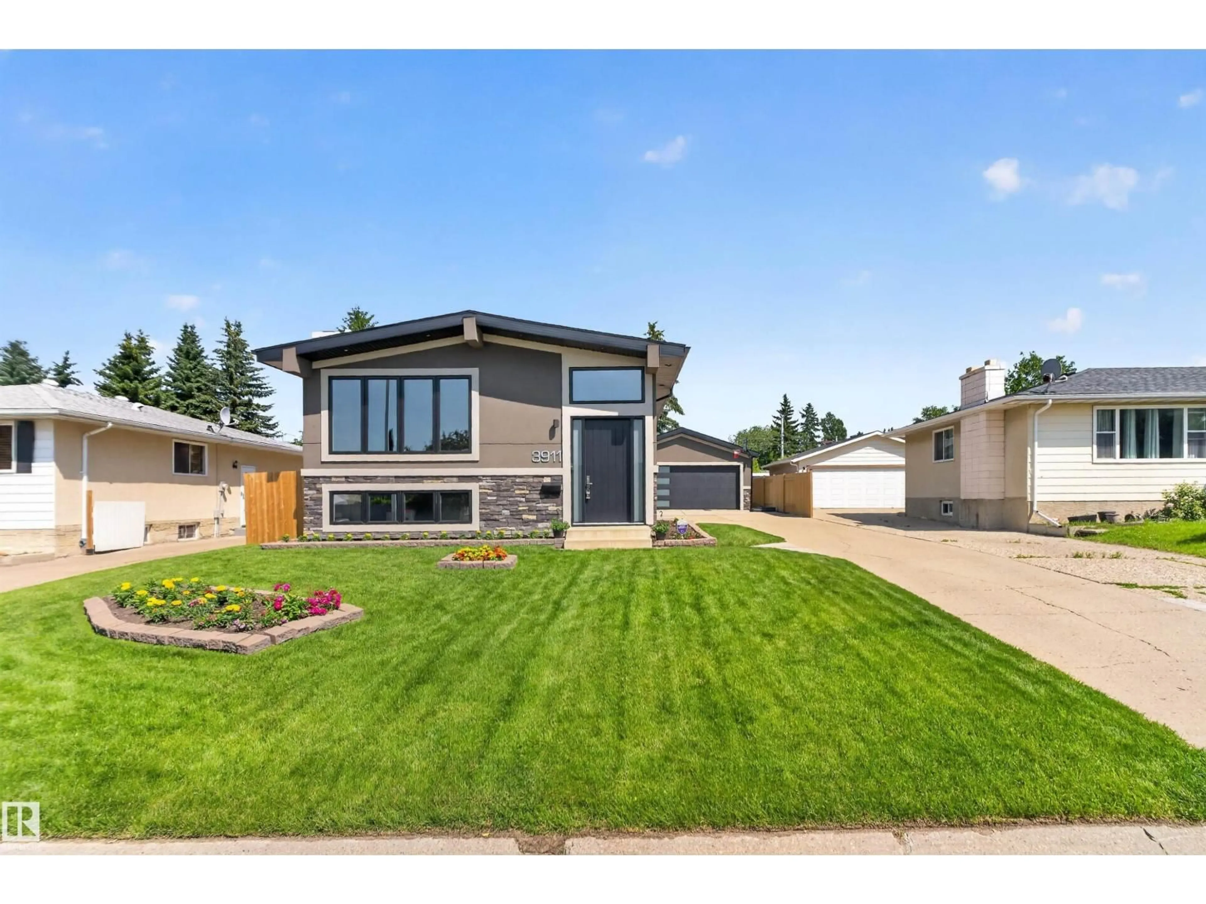 Home with vinyl exterior material, street for 3911 67 ST, Edmonton Alberta T6K2N7