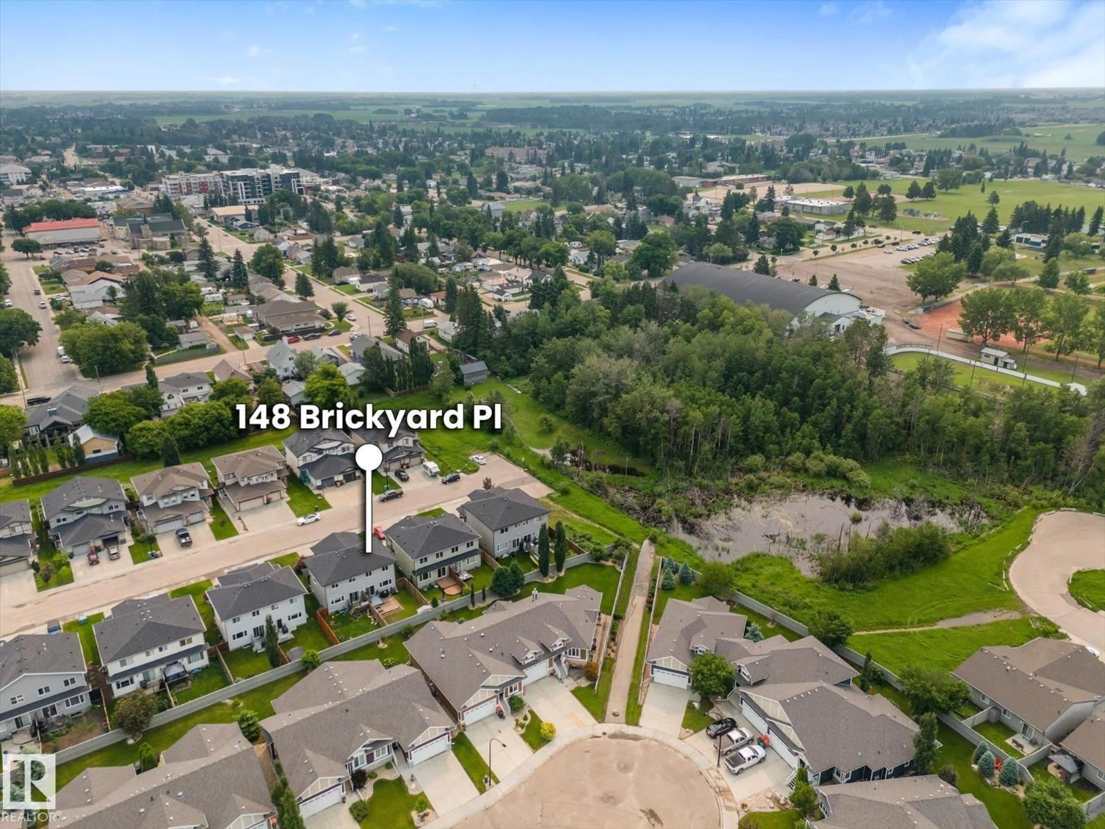 A pic from outside/outdoor area/front of a property/back of a property/a pic from drone, city buildings view from balcony for 148 BRICKYARD PL, Stony Plain Alberta T7Z0H9